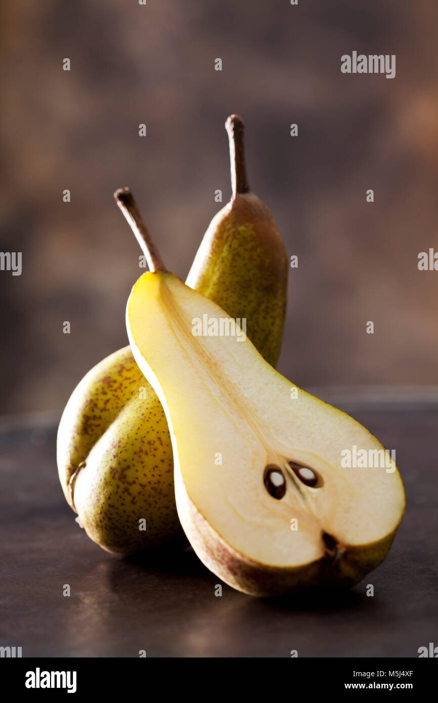Whole and sliced pear Stock Photo