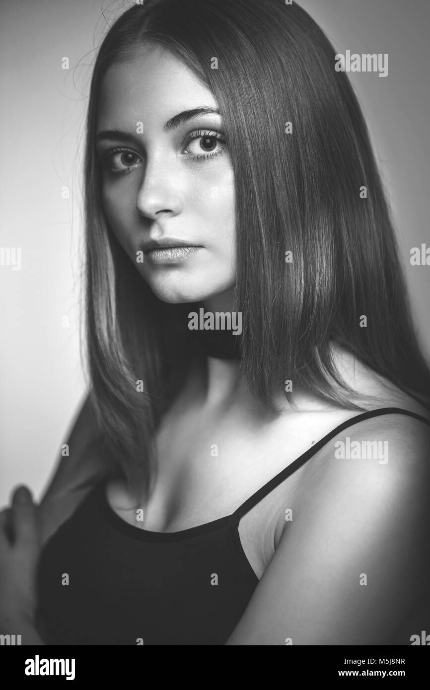 Portrait of a beautiful young woman. Black and white photo Stock Photo