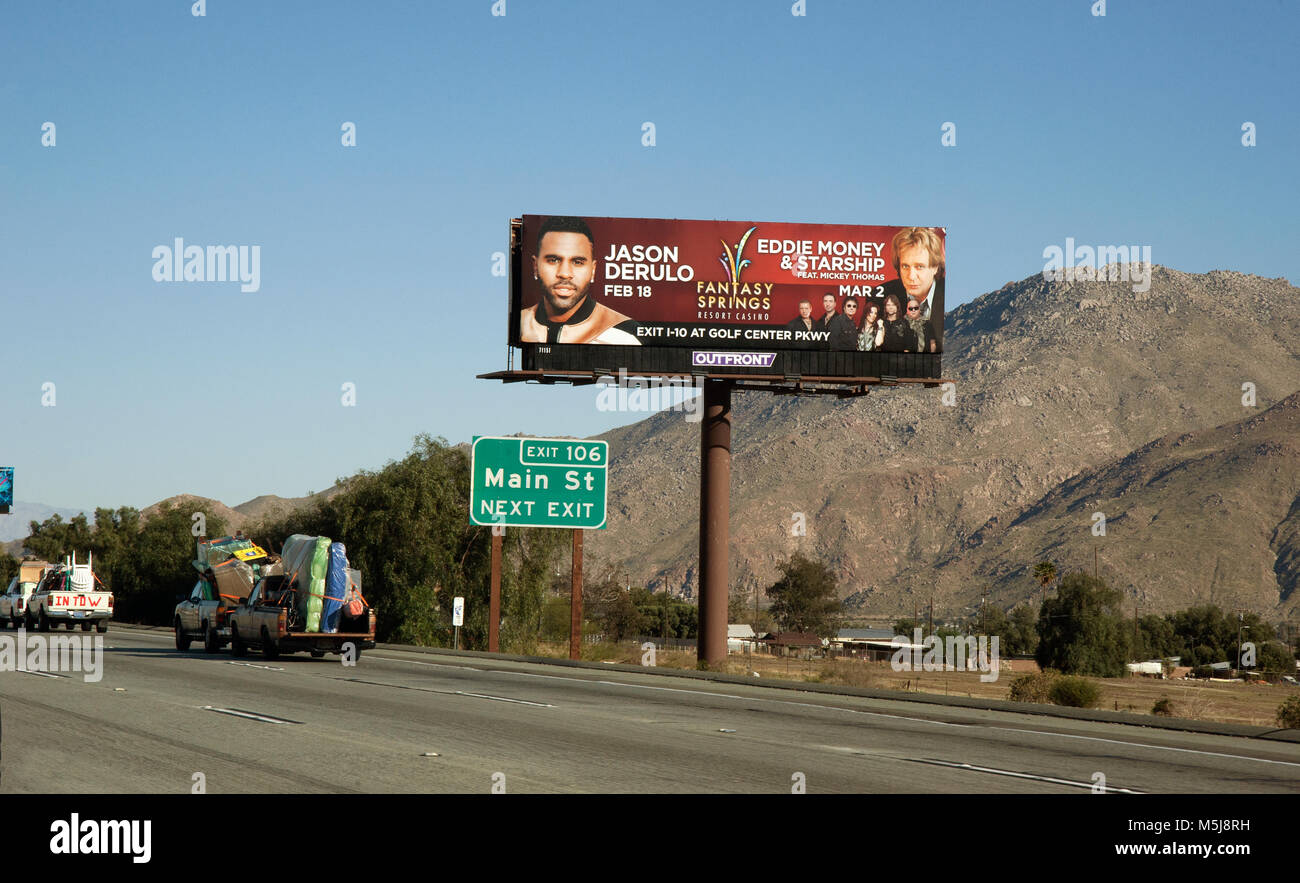 Billboard for Fantasy Springs Casino promotes appearances by Jason Derulo and Eddie Money on highway heading to Palm Springs, CA Stock Photo