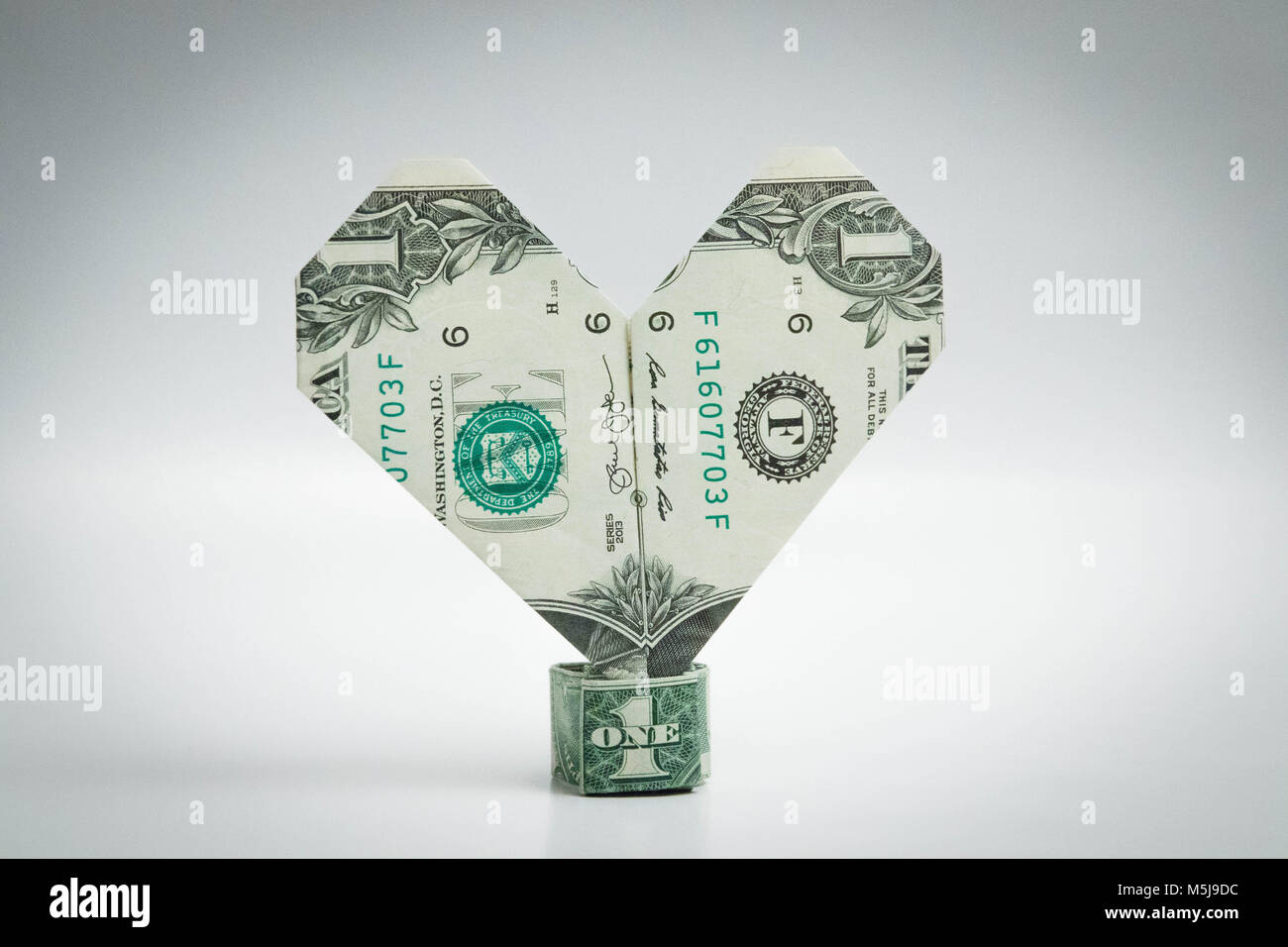Origami Heart And Ring Dollar Bill One Dollar Stock Photo
