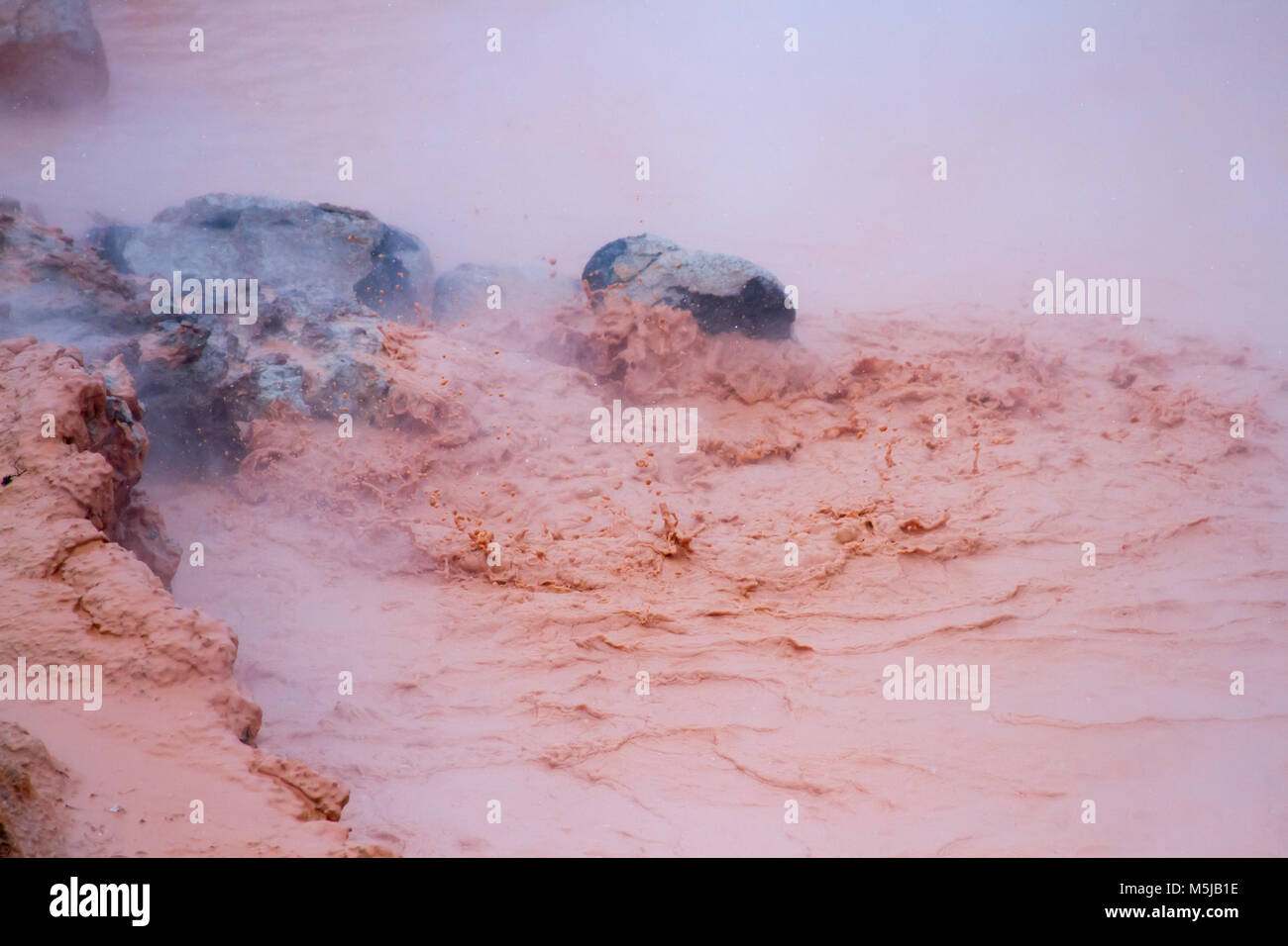 Close up of mud boiling and splashing in iconic hot pots at Fountain