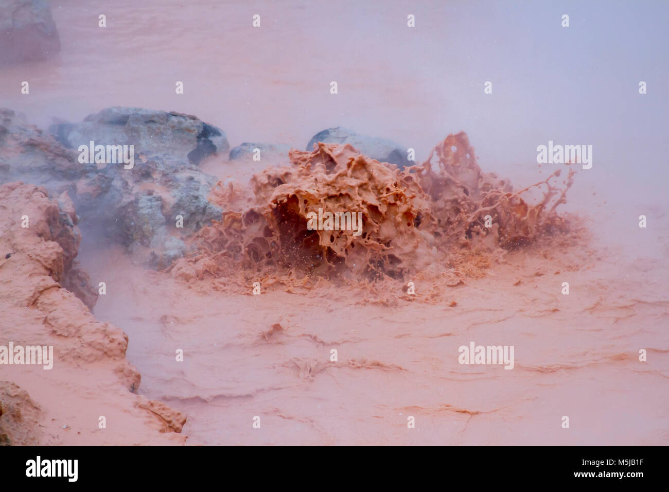Close up of mud boiling and splashing in iconic hot pots at Fountain