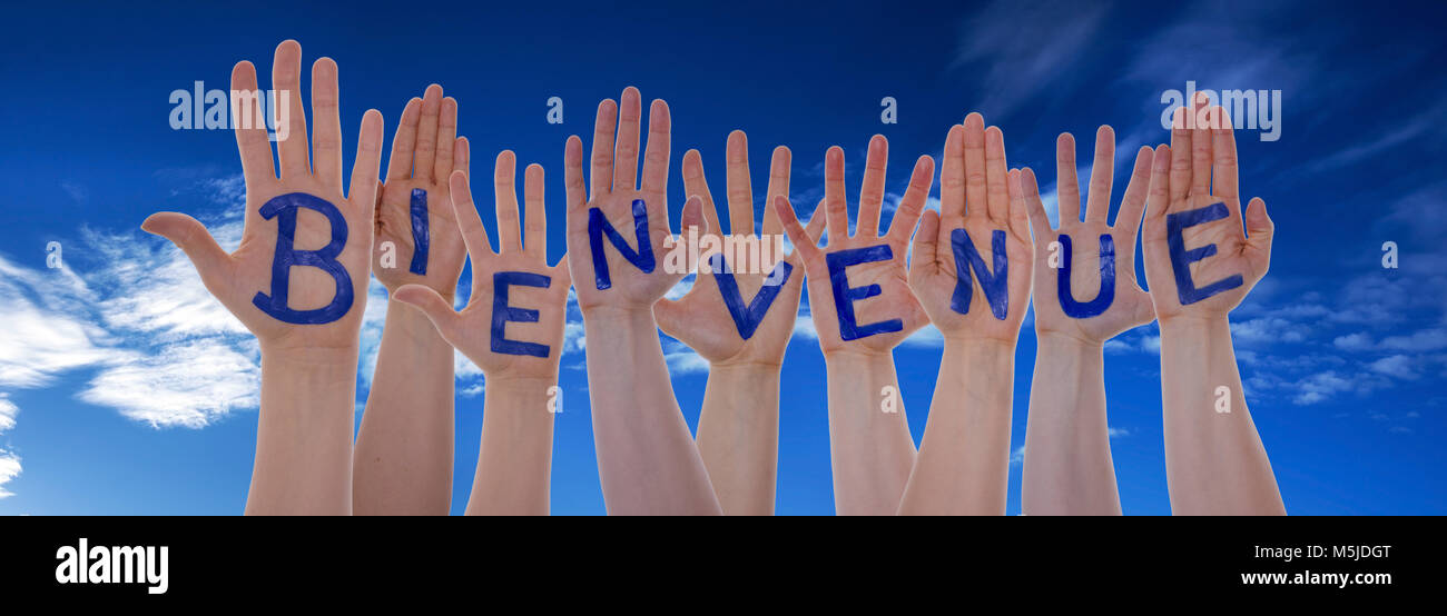 Group hands holding word welcome sky hi-res stock photography and ...