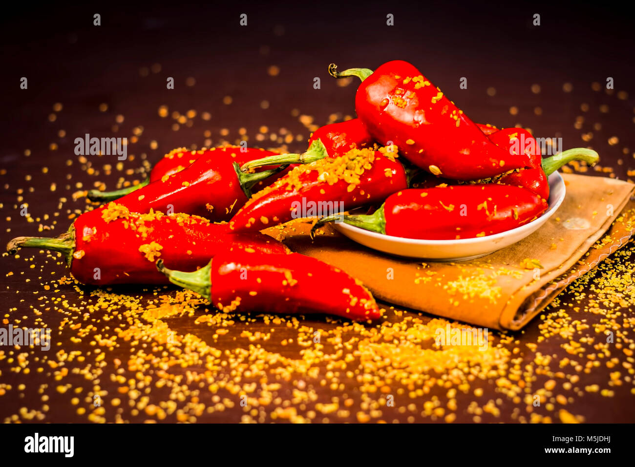 Red chilli pickle marinated in mustard seeds and mustard oil. Dark