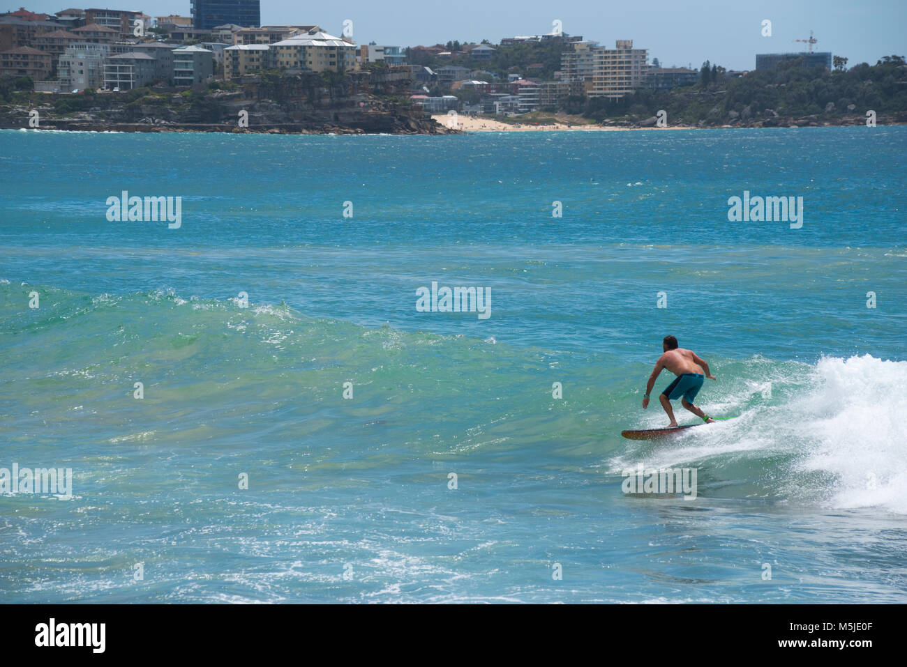 Surfing at Manly Beach on a summer day, Sydney, Australia Stock Photo