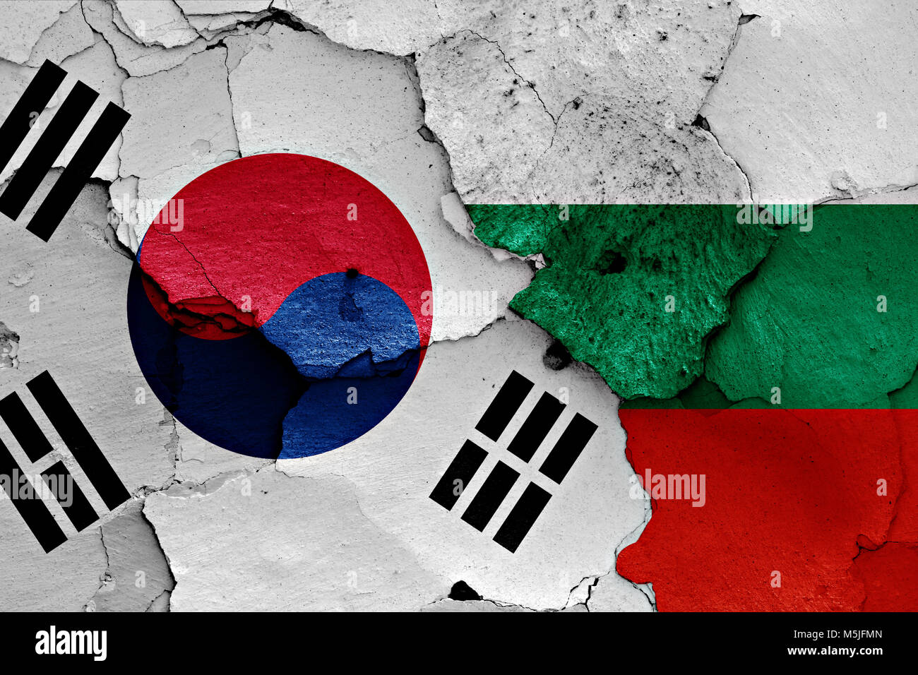 flag of South Korea and Bulgaria painted on cracked wall Stock Photo