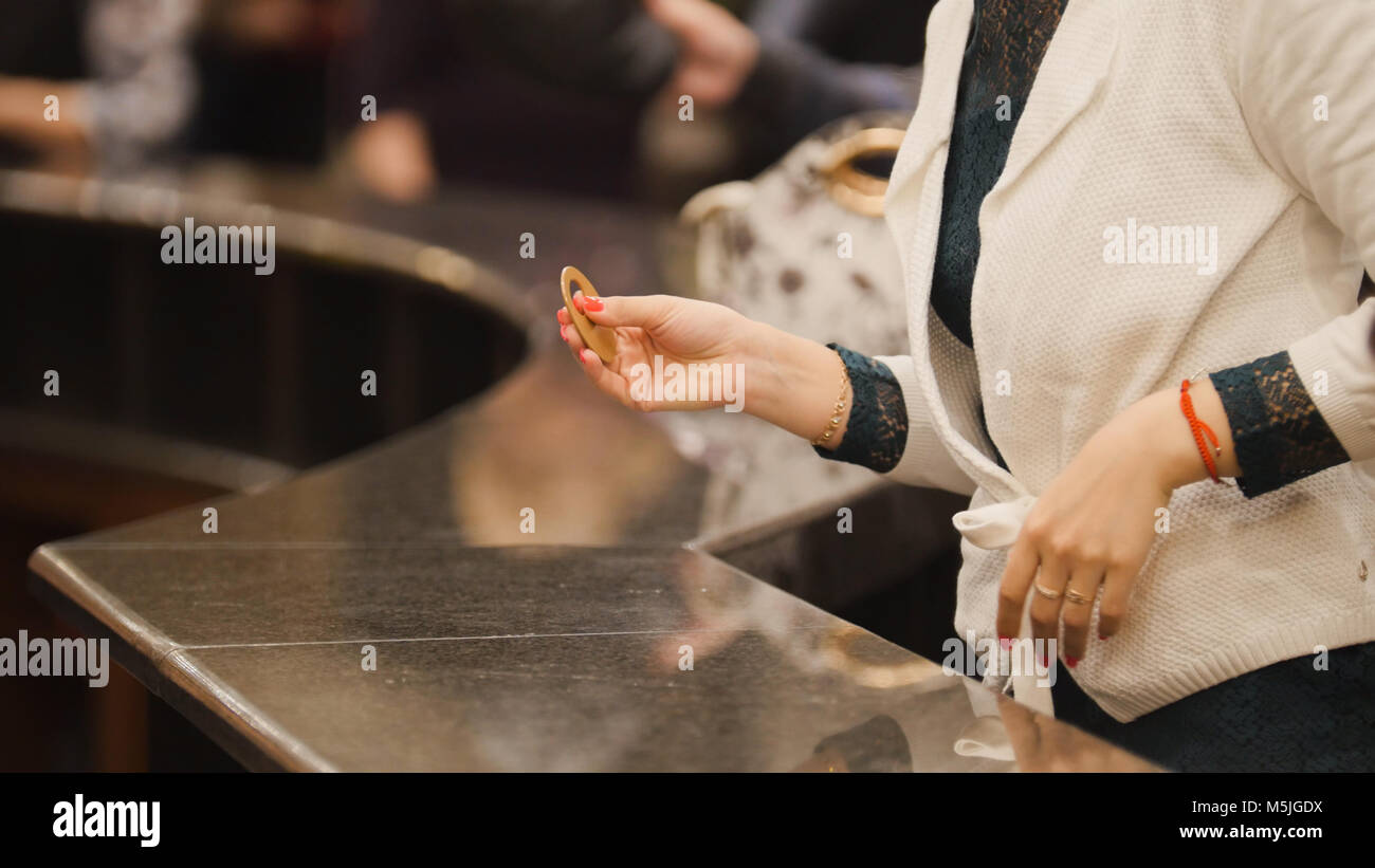Wardrobe in hall of theatre the audience pass the clothes in the