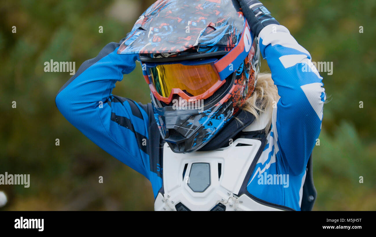 MX moto Girl in a helmet - cross racing Stock Photo