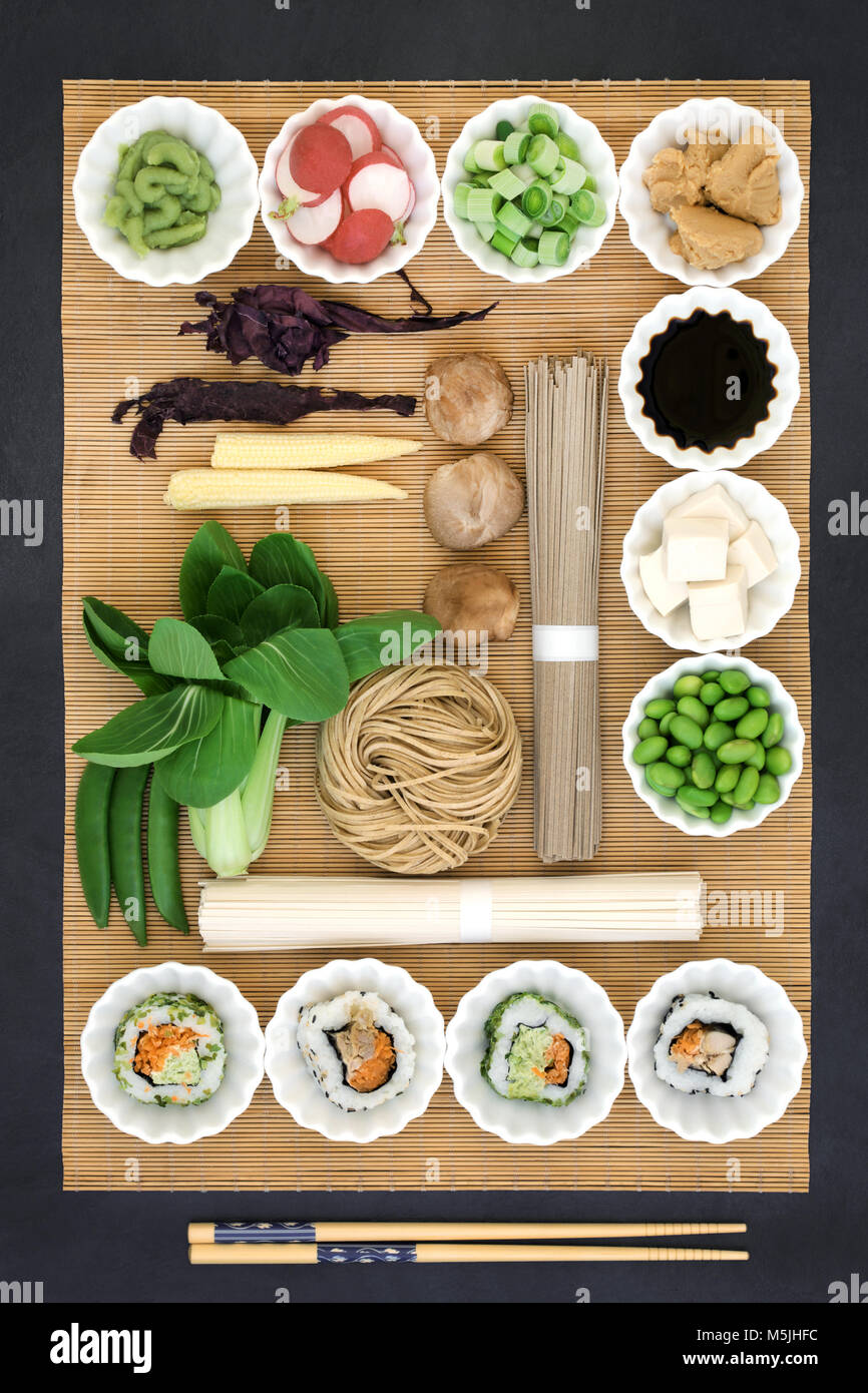 Healthy macrobiotic Japanese food with udon and soba noodles, sushi