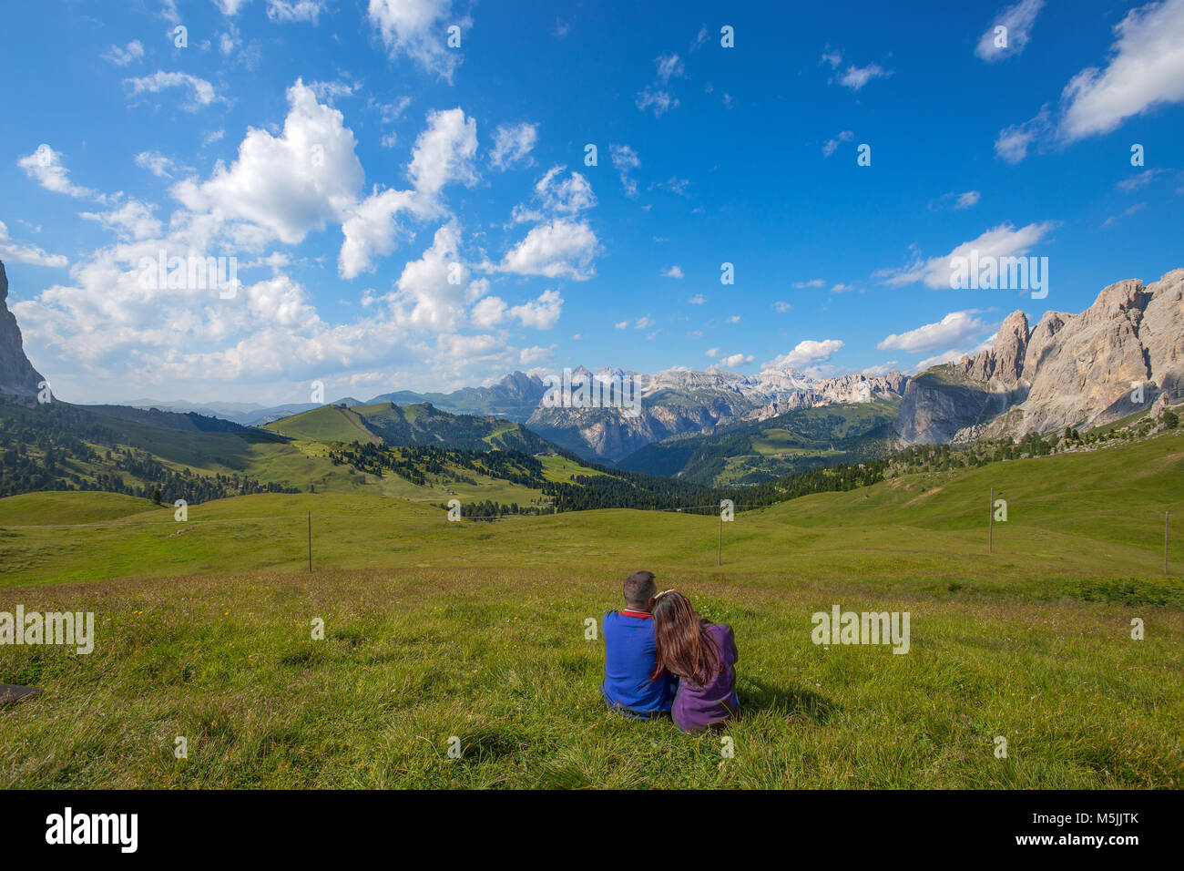 Couple looking at a mountain panorama Stock Photo