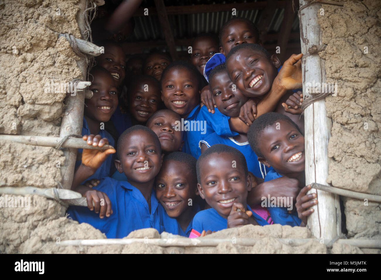 Happy primary school pupils in village school in Sierra Leone Stock Photo