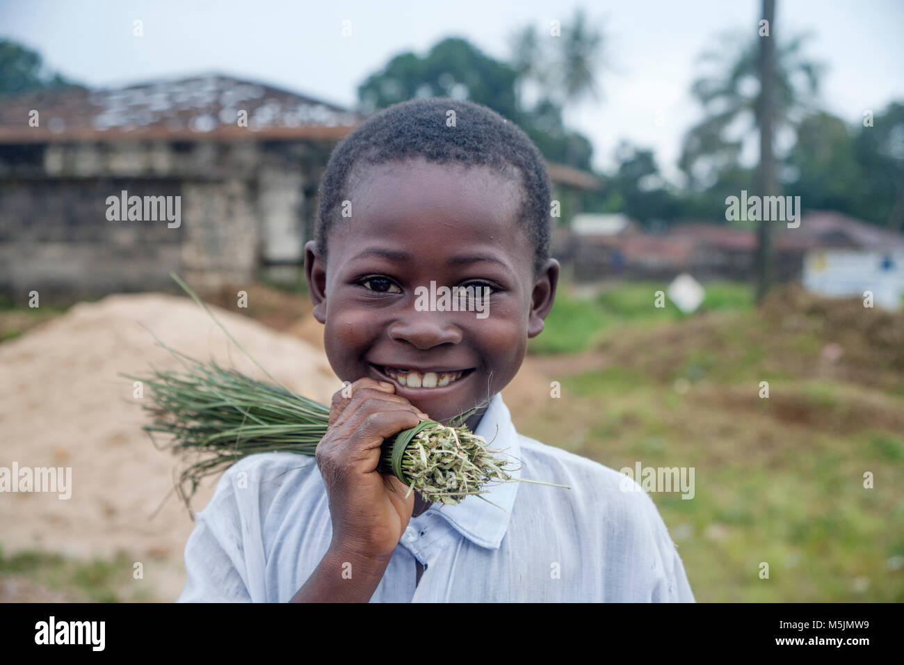 Portrait of smiling African boy from Kono village in Sierra Leone Stock Photo
