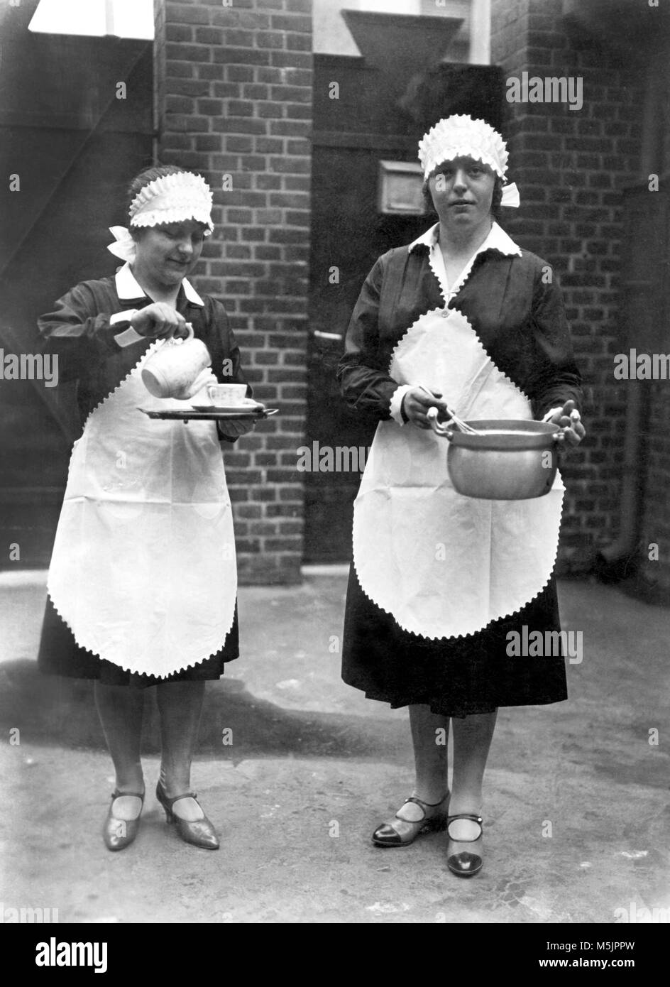 Two waitresses or maids,1910s,Germany Stock Photo