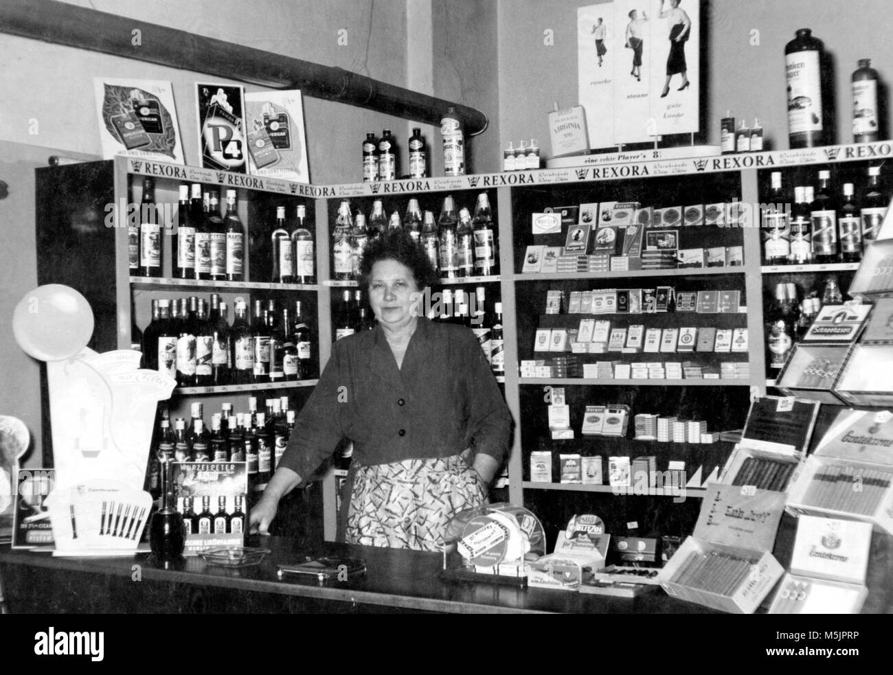 Seller of tobacco and spirits,1950s,Germany Stock Photo Alamy