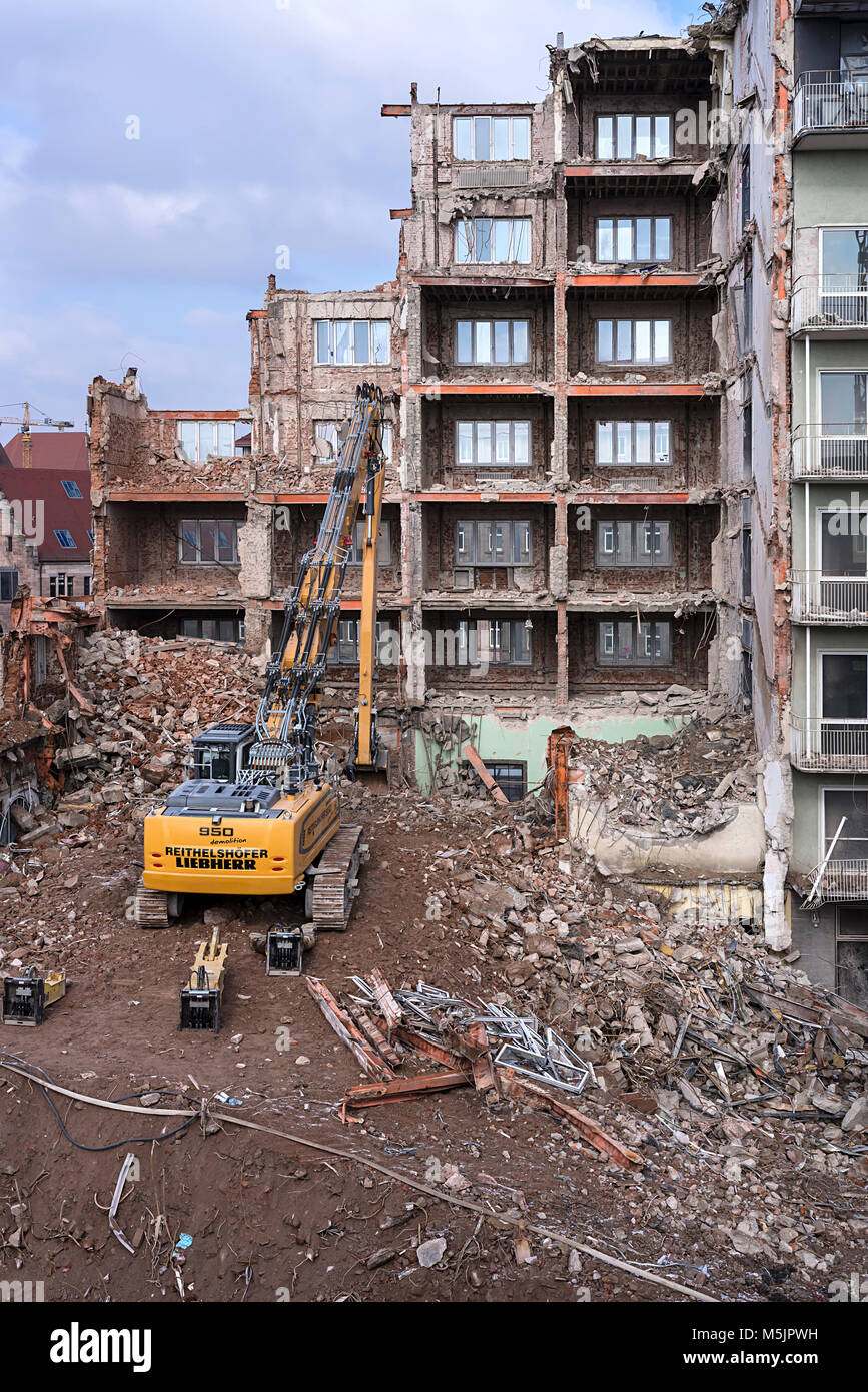 Construction site,Excavator demolishing the administration building of the former main post office,Nuremberg,Middle Franconia Stock Photo