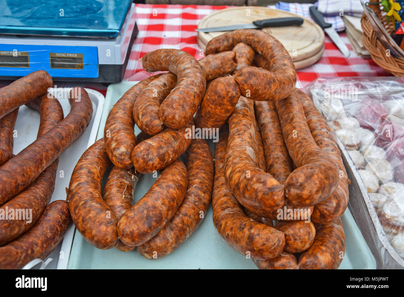 Freshly produced sausages that are put up for sale Stock Photo Alamy