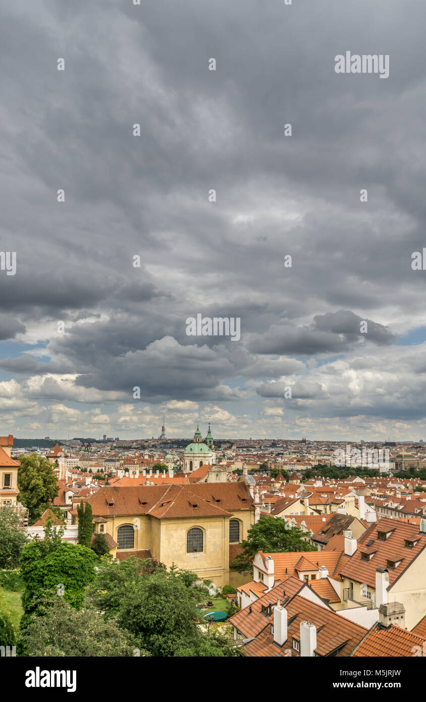 A view of Prague's old town from Petrin Hill as storm clouds gather over the historic Eastern European city. Stock Photo
