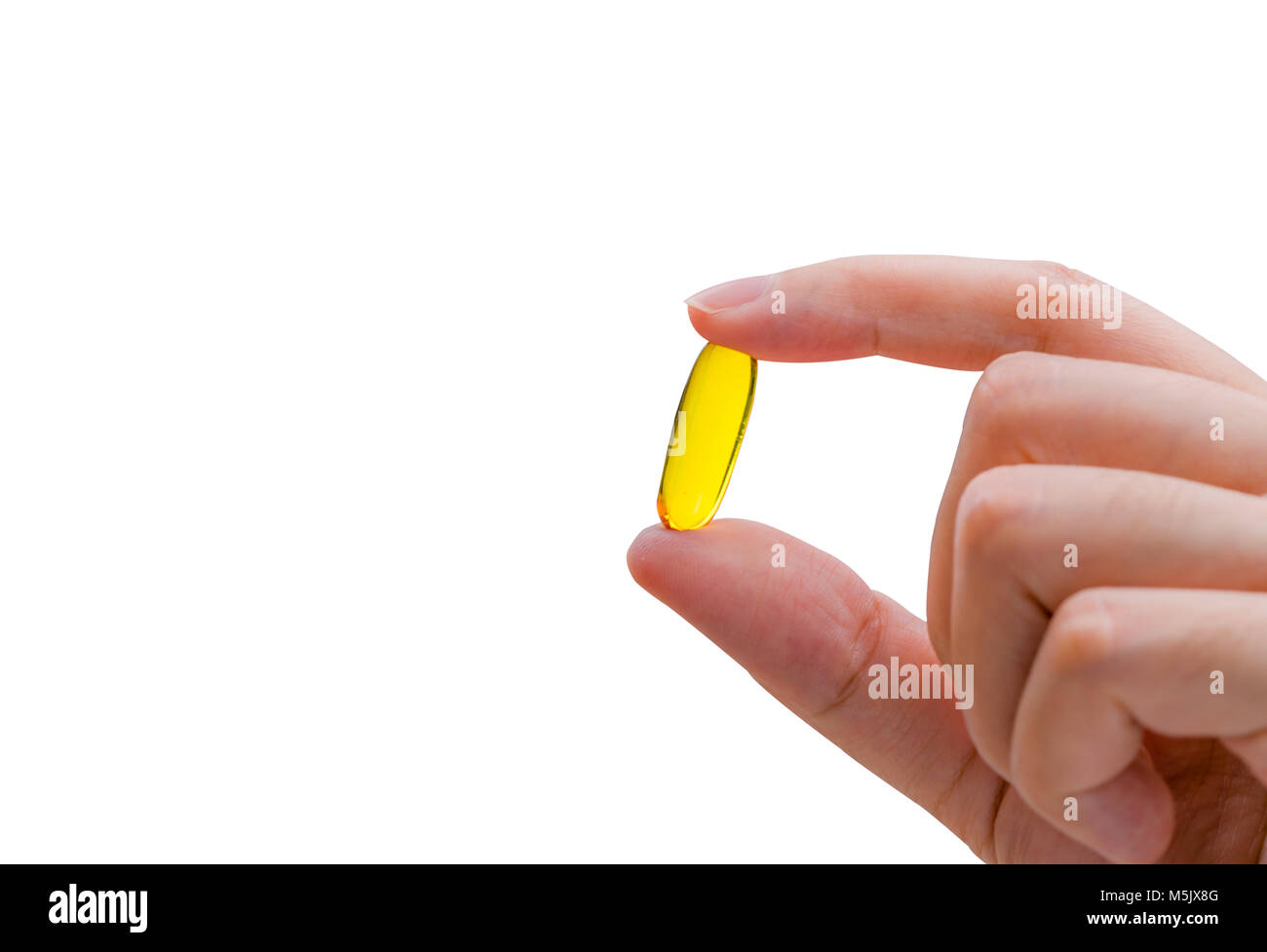 Young woman hand hold fish oil capsule. Woman taking omega3 pills