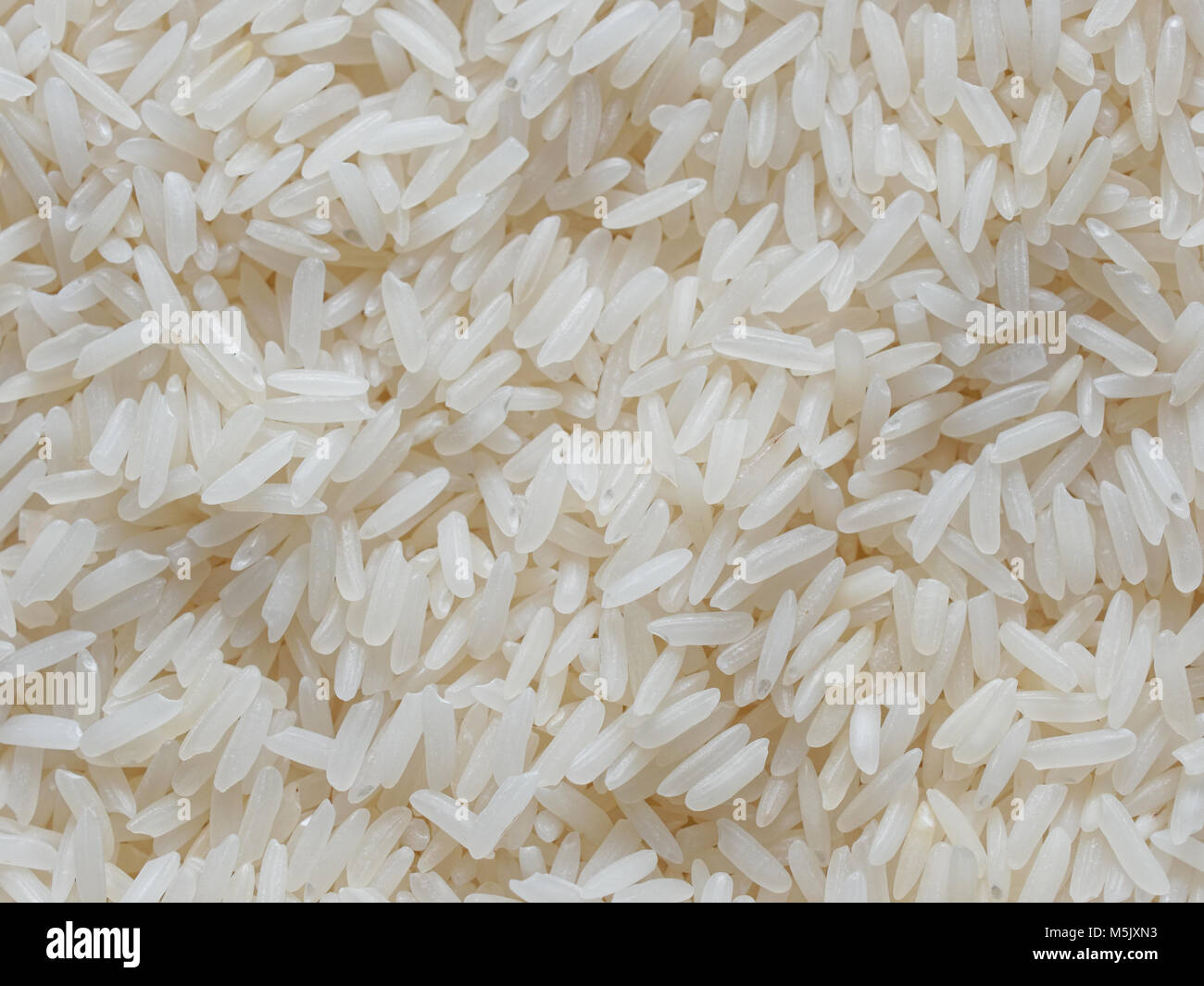 Raw rice hi-res stock photography and images - Alamy