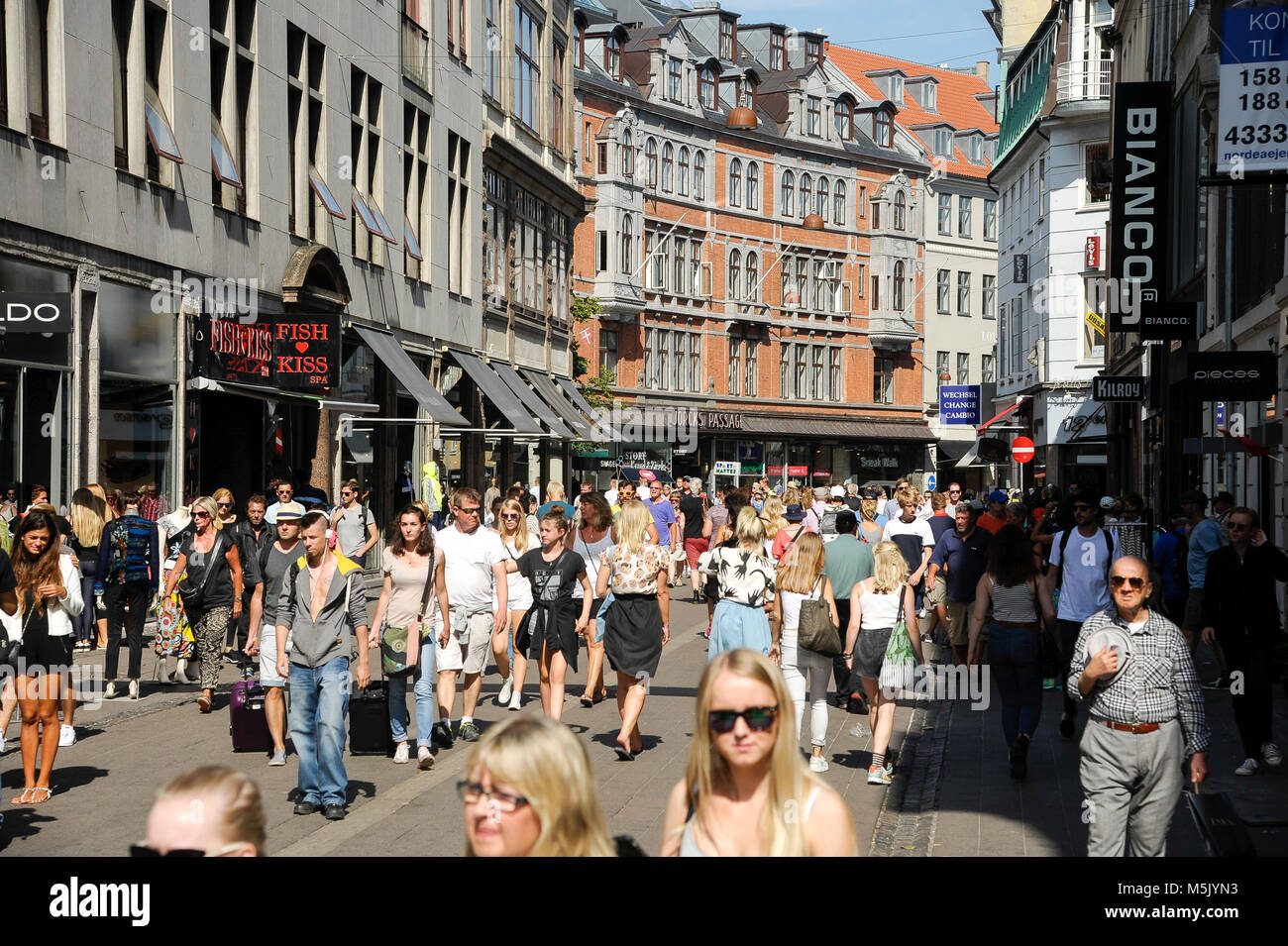 1100 m long pedestrian zone called Stroget between Radhuspladsen and Kongens Nytorvo in Copenhagen, Denmark. August 6th 2015, is a very popular touris Stock - Alamy