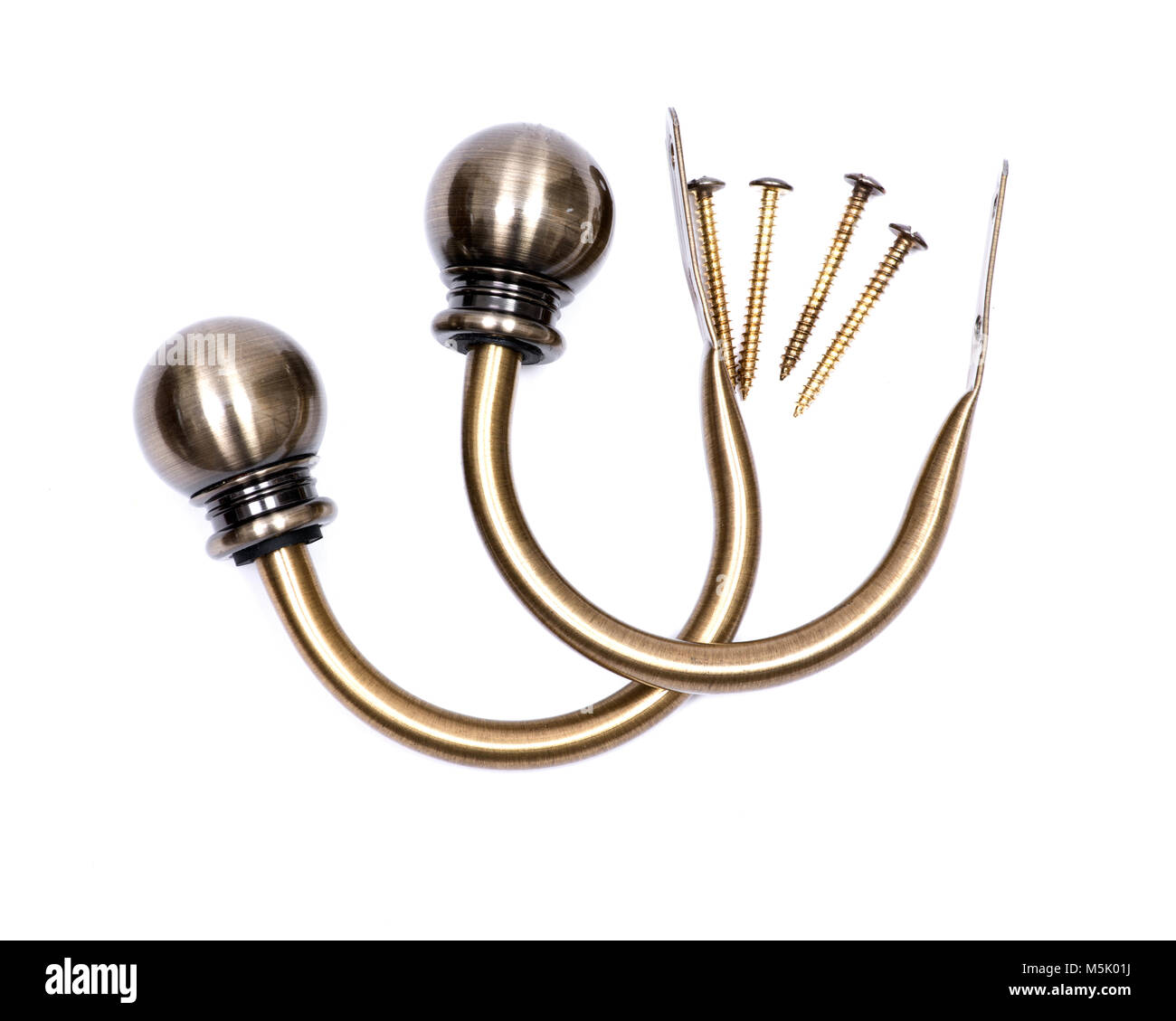 Brass ball window curtain holdback pair with screws isolated on white