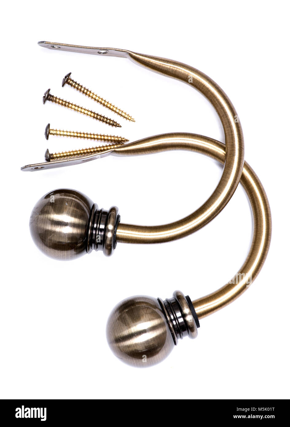 Brass ball window curtain holdback pair with screws isolated on white