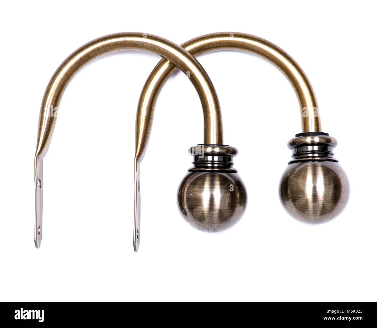 Brass ball window curtain holdback pair isolated on white background