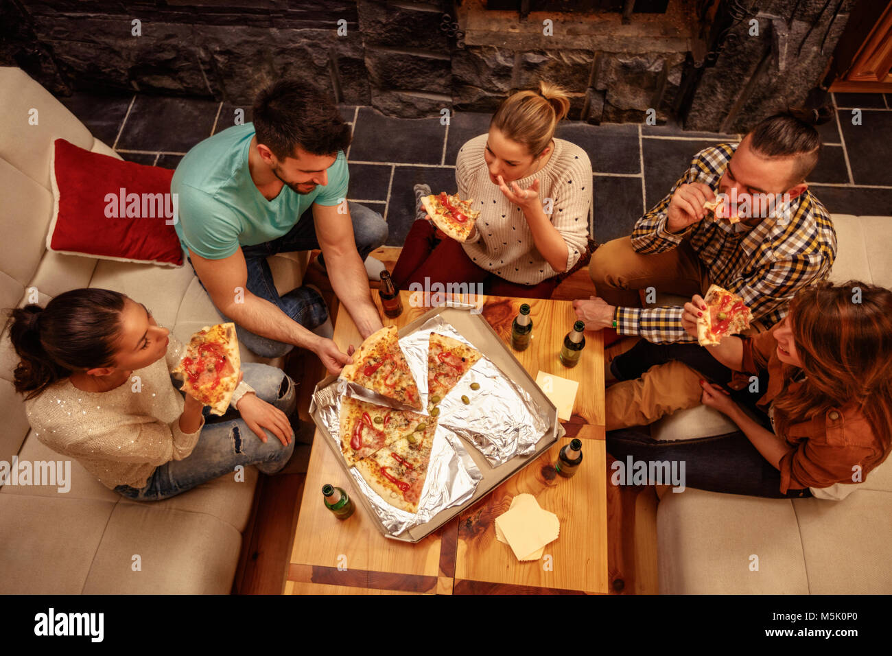 Friends Eating Pizza Together Sharing Platters Stock Photo 1038714430