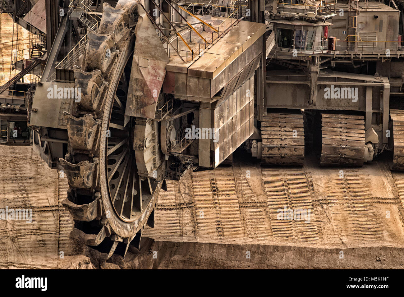 Huge bucket wheel excavator mining for brown coal in an open pit mine