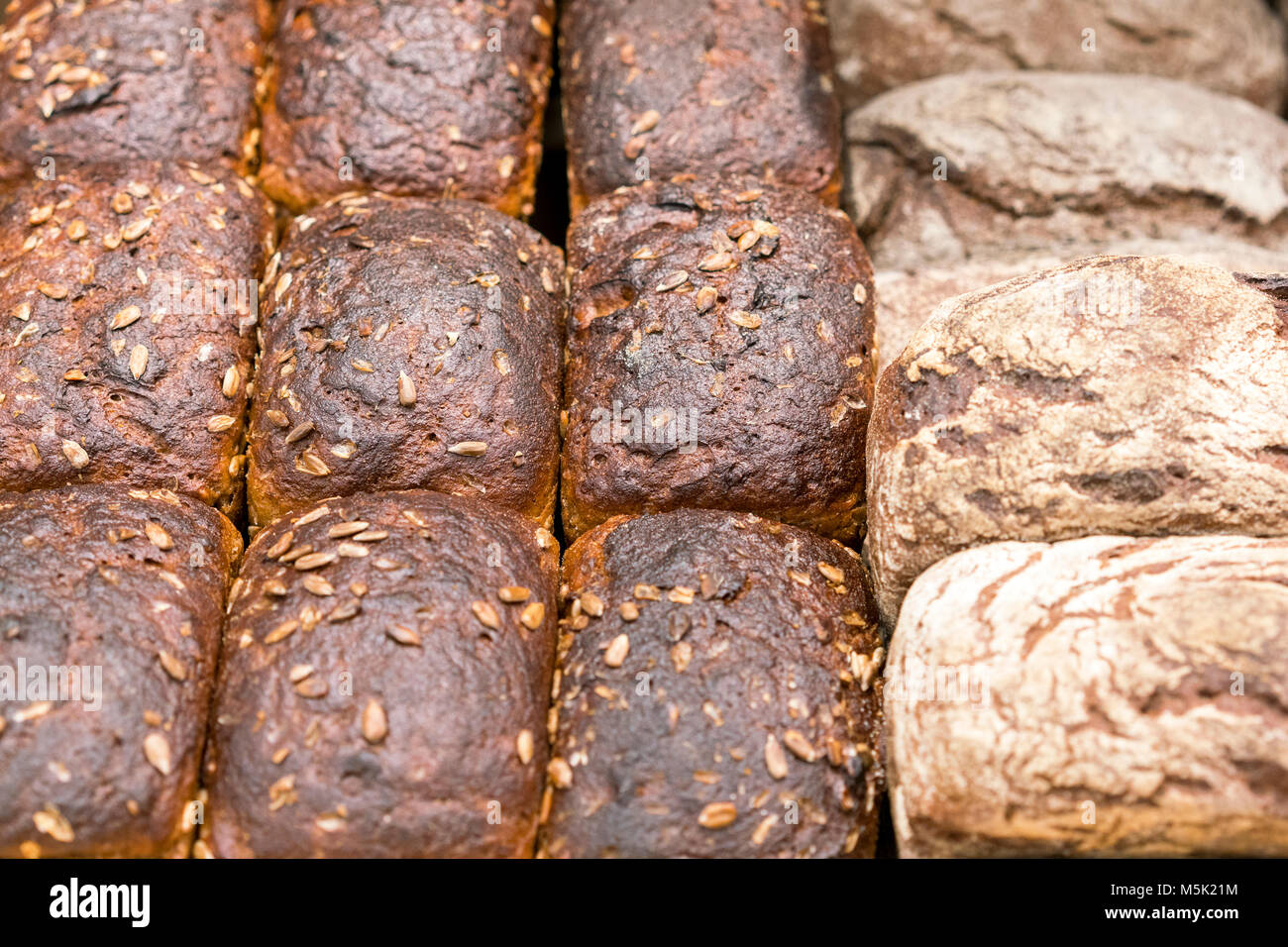 Freshly baked black bread of different kinds Stock Photo Alamy