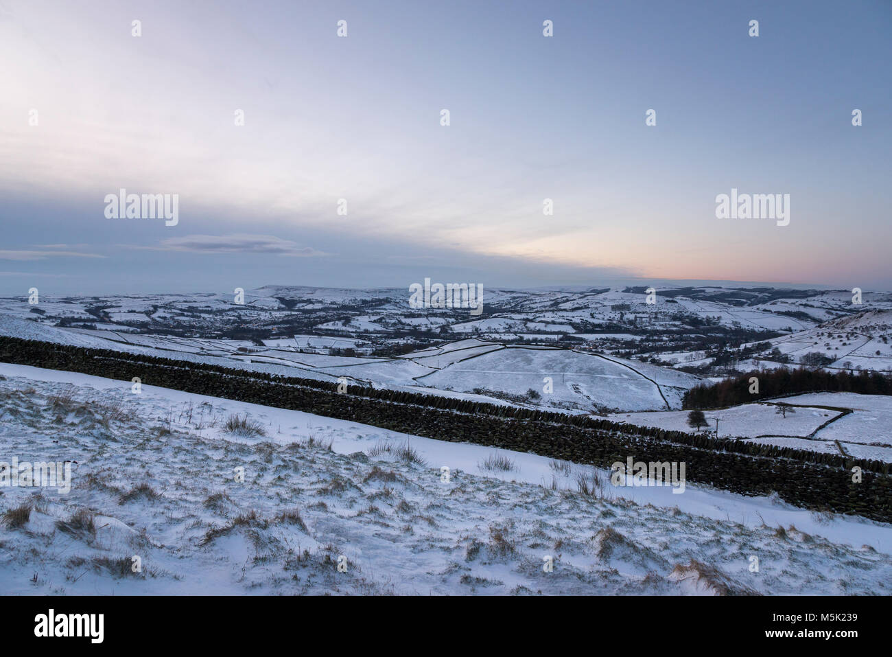 Snowy winter morning in the hills of the Peak District. View to Chapel-en-le-frith, Derbyshire, England. Stock Photo