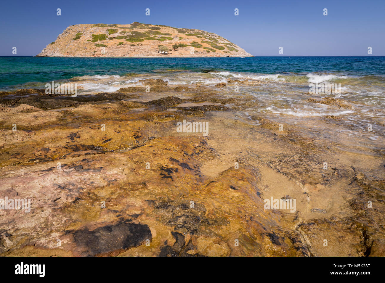 Rocky shoreline at Mochlos on the Mediterranean island of Crete Stock ...