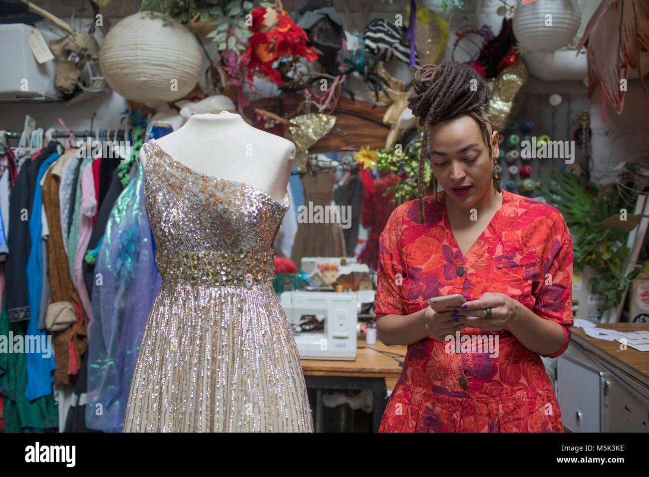 Portrait of stylish young female fashion designer at work Stock Photo ...