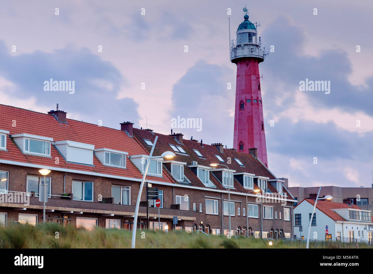 Scheveningen Lighthouse at sunset. Scheveningen, South Holland, Netherlands. Stock Photo