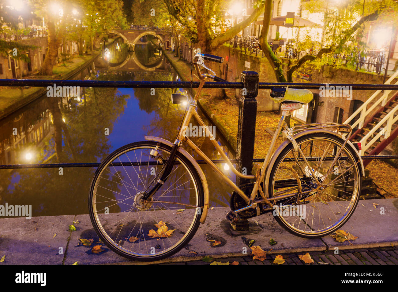 Old bike on the bridge in Utrecht. Utrecht, South Holland, Netherlands. Stock Photo