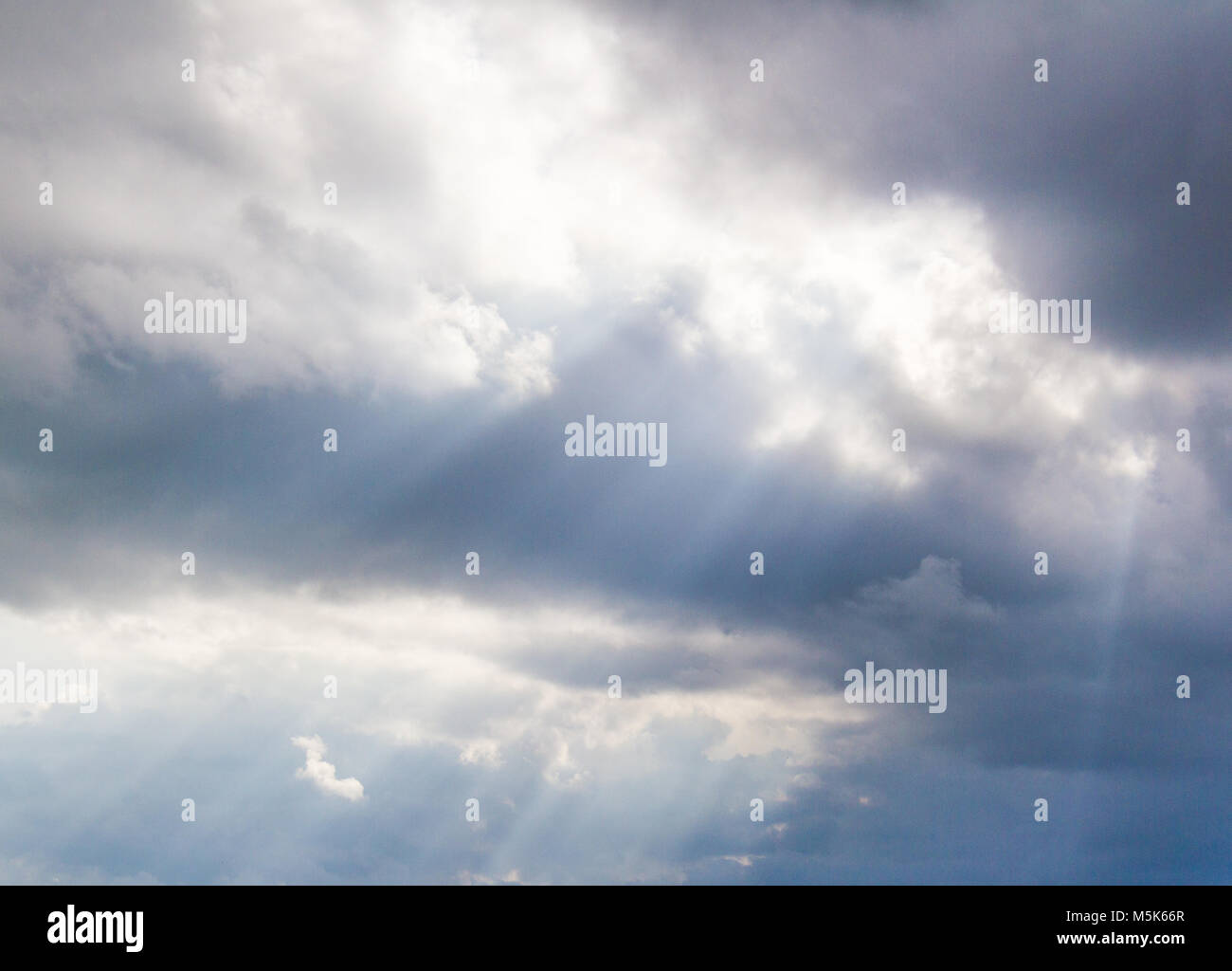 Blue sky background with white fluffy clouds Stock Photo - Alamy