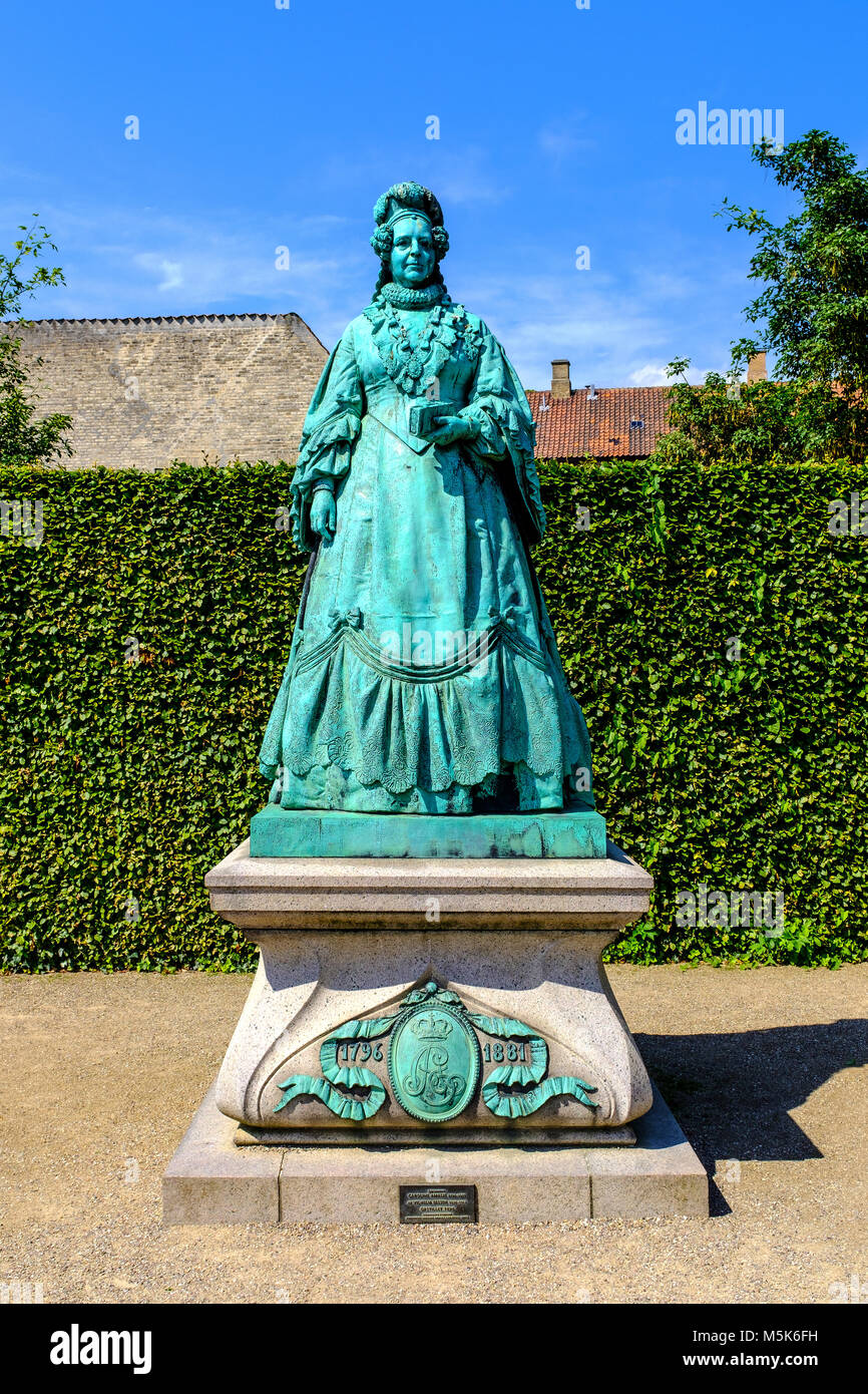 Copenhagen, Zealand region / Denmark - 2017/07/26: city center - royal King’s Garden Kondens Have park and a statue of the Queen Caroline Amalie Stock Photo