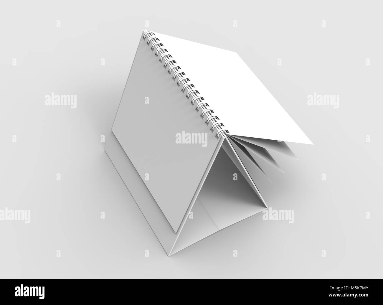 Desktop spiral binding calendar isolated on soft gray background. 3D