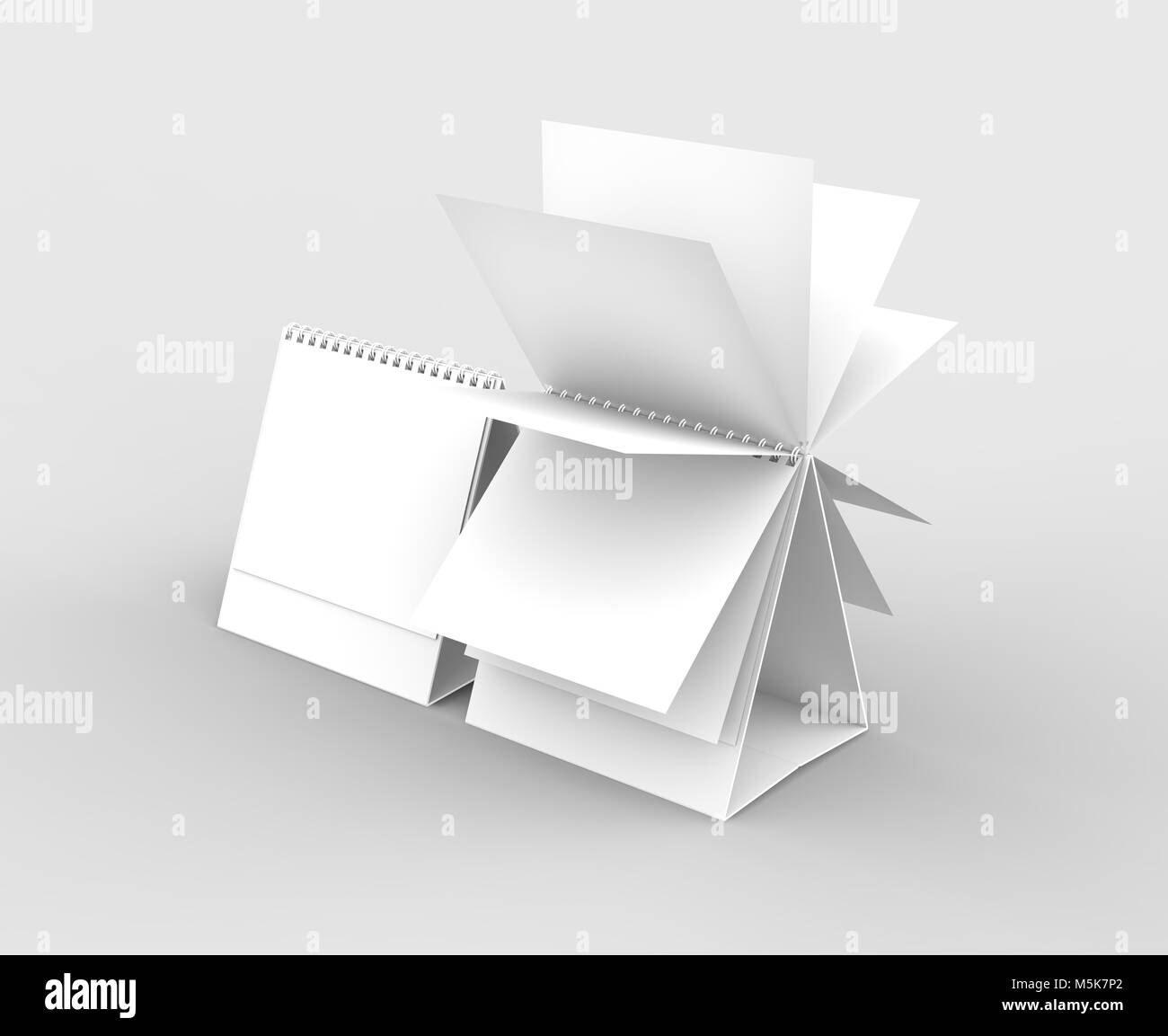 Desktop spiral binding calendar isolated on soft gray background. 3D