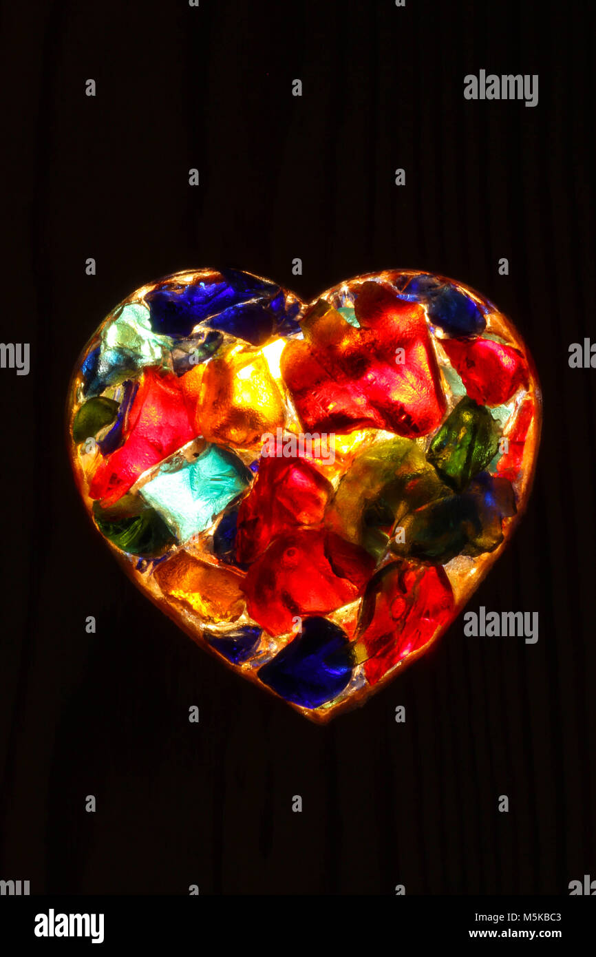 Heart - closeup of back lit stained  glass Stock Photo