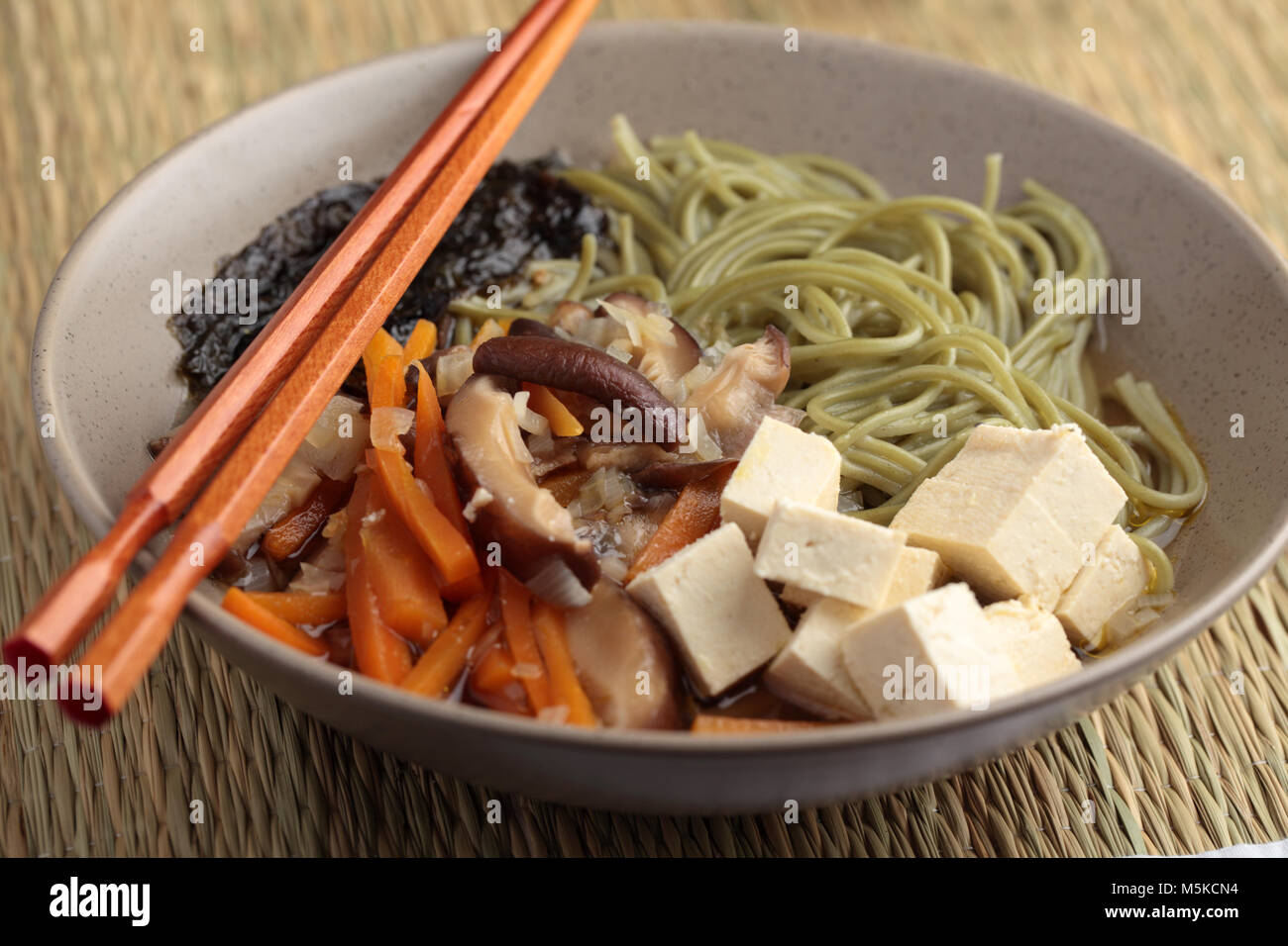 Japanese shiitake, soba, and tofu soup Stock Photo Alamy