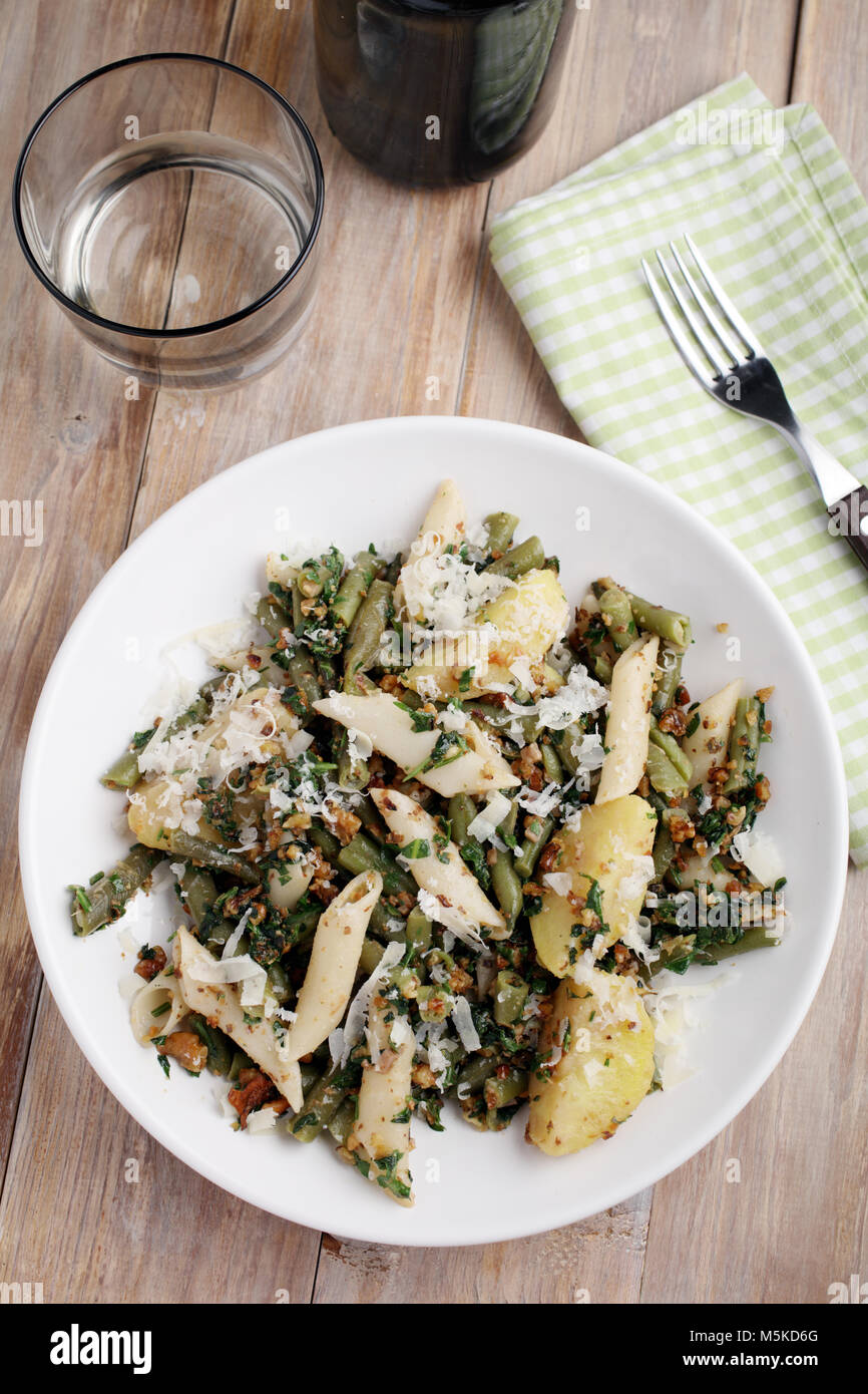 Pasta, potato, and green beans with pesto and Parmesan cheese Stock