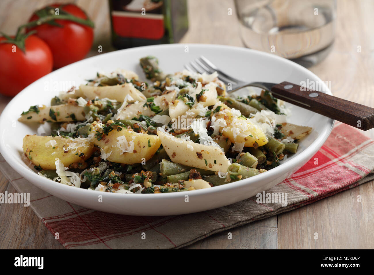 Pasta, potato, and green beans with pesto and Parmesan cheese Stock Photo Alamy
