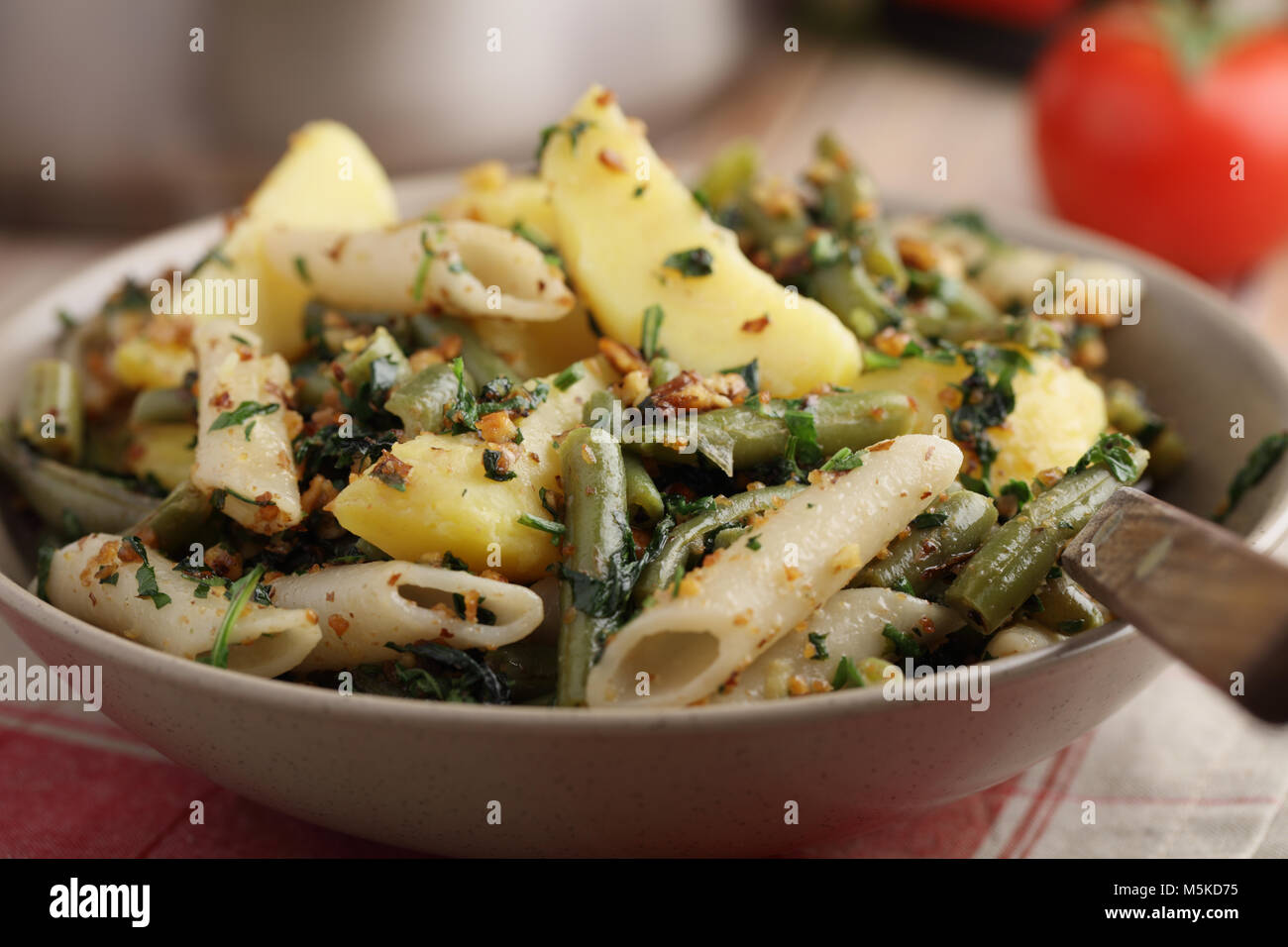 Pasta, potato, and green beans with pesto Stock Photo