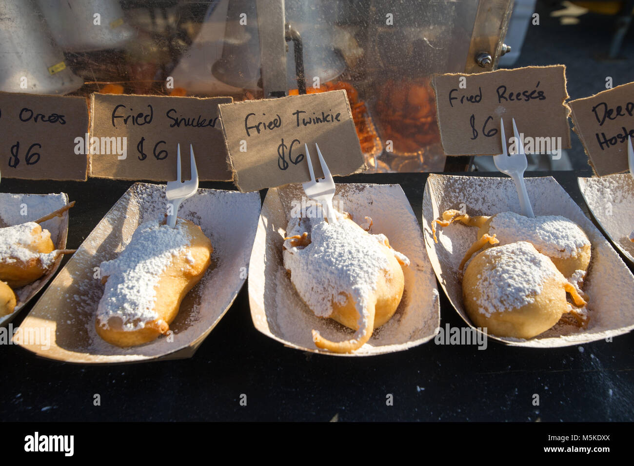 Assortment of deep friend candy bars sitting on counter at food truck ready to be eaten, Greensboro, North Carolina. Stock Photo