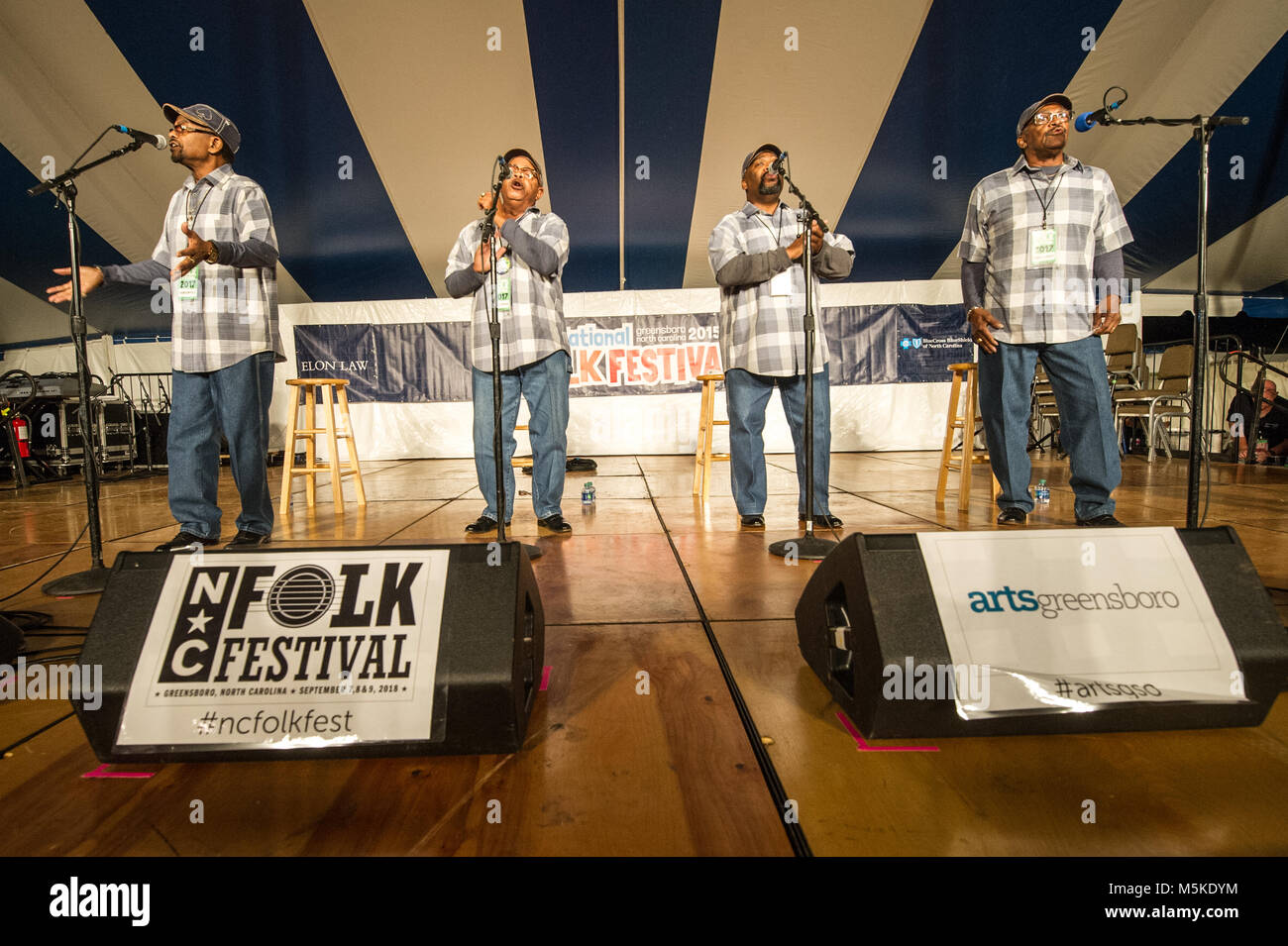 Fairfield Four members singing in harmony on stage for National Folk