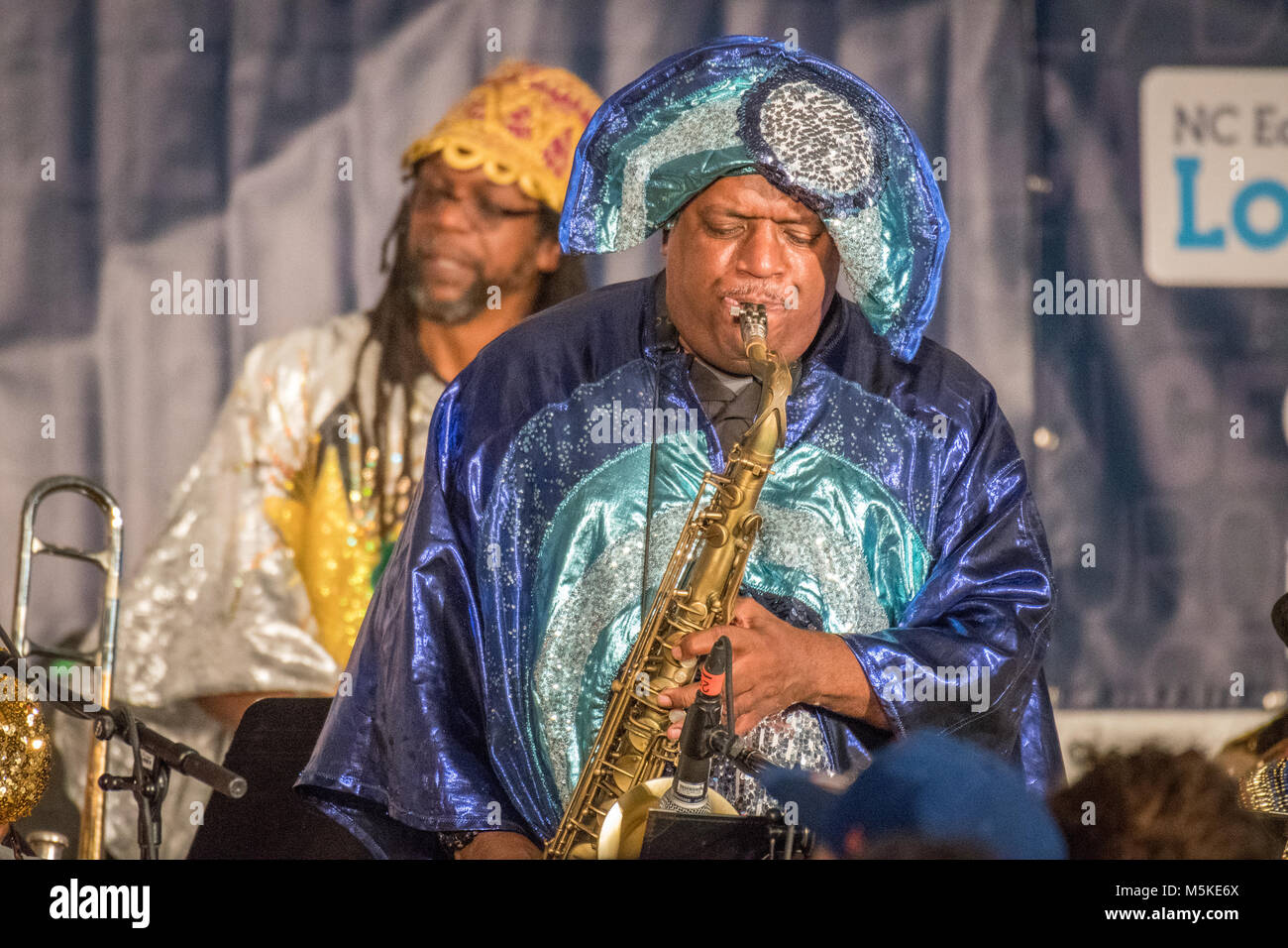 Male member in the cosmic group Sun Ra Arkestra playing the saxophone at National Folk Life Festival Greensboro, North Carolina. Stock Photo