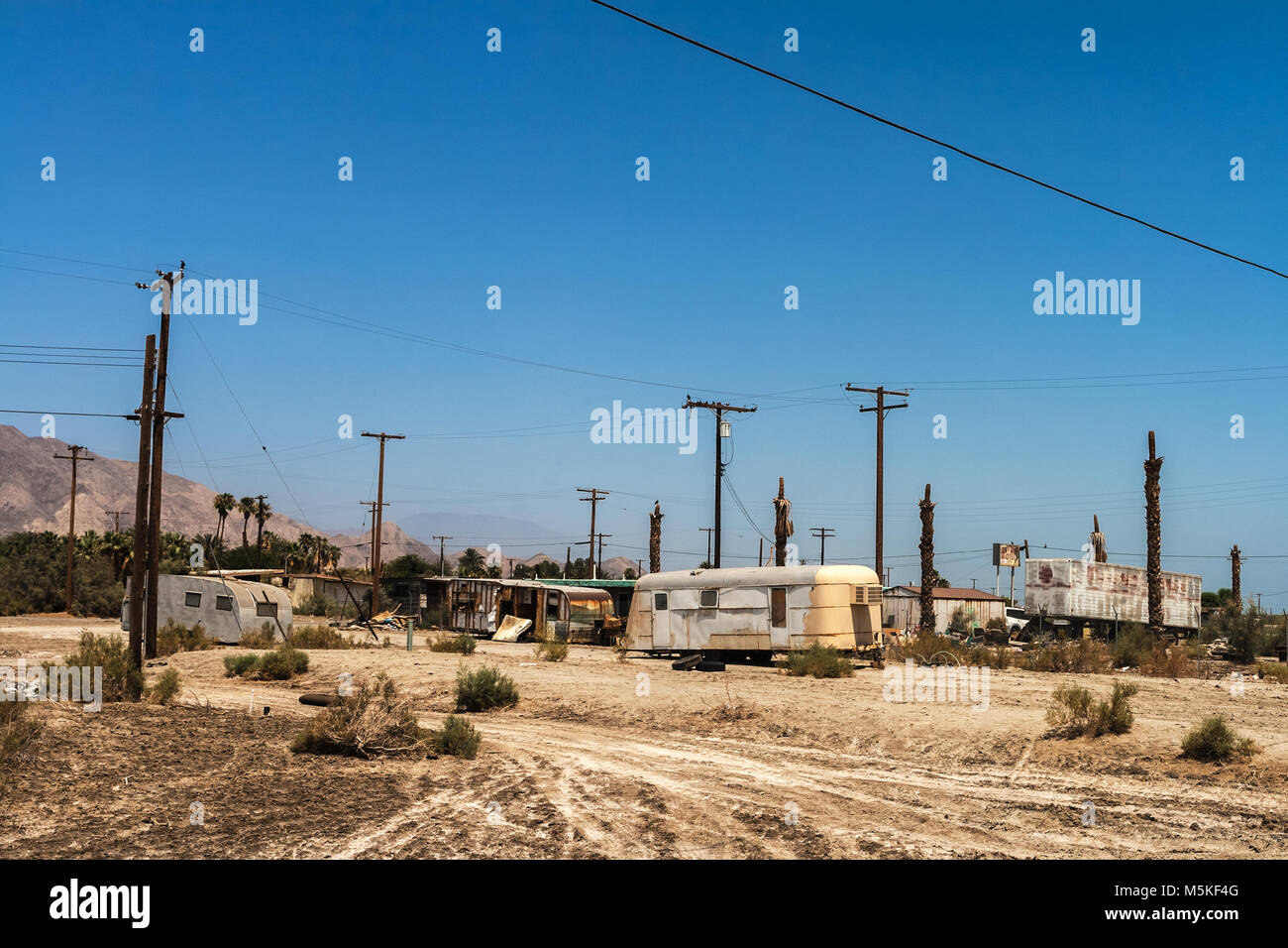 Torn and abandoned trailers and vehicles in Salton Sea, California Stock Photo