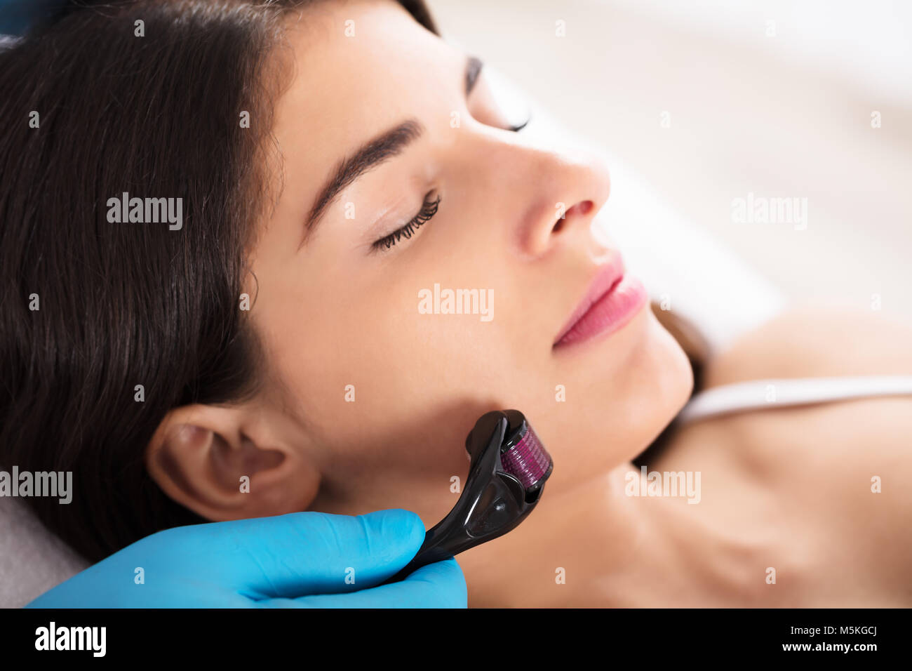 Close-up Of A Woman Having Facial Treatment On Her Face In Beauty Salon Stock Photo