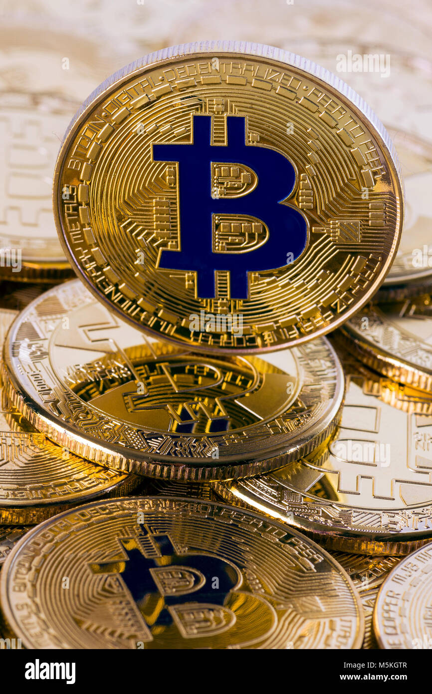 Pile of bitcoins with single coin standing on top of the other, financial  background or cryptocurrency concept, selective focus on one bitcoin Stock  Photo - Alamy